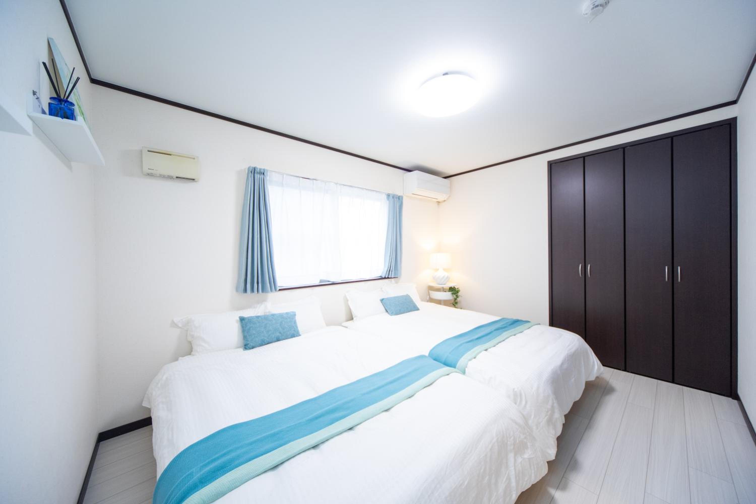 Three-Bedroom House - Photo 25