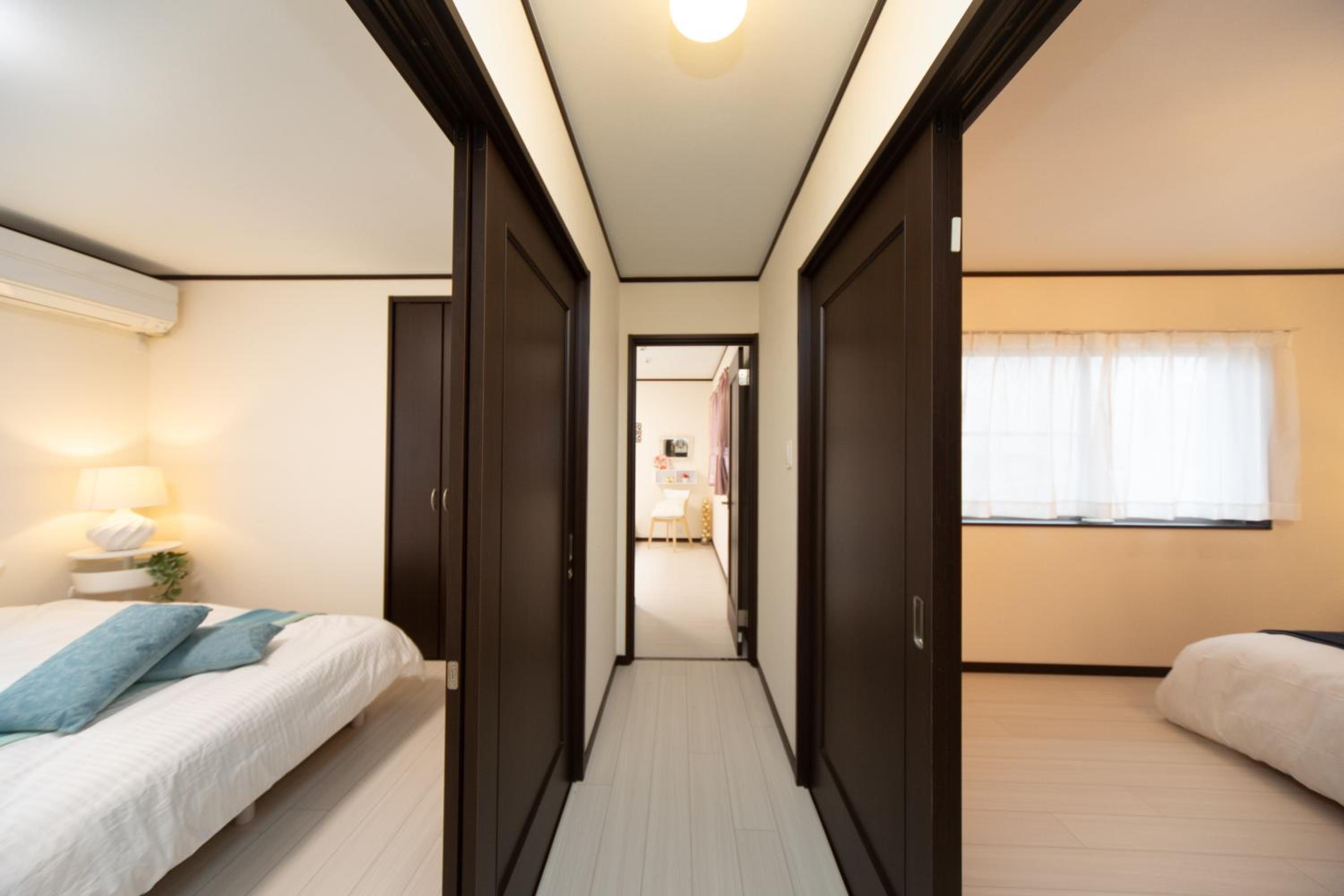 Three-Bedroom House - Photo 30