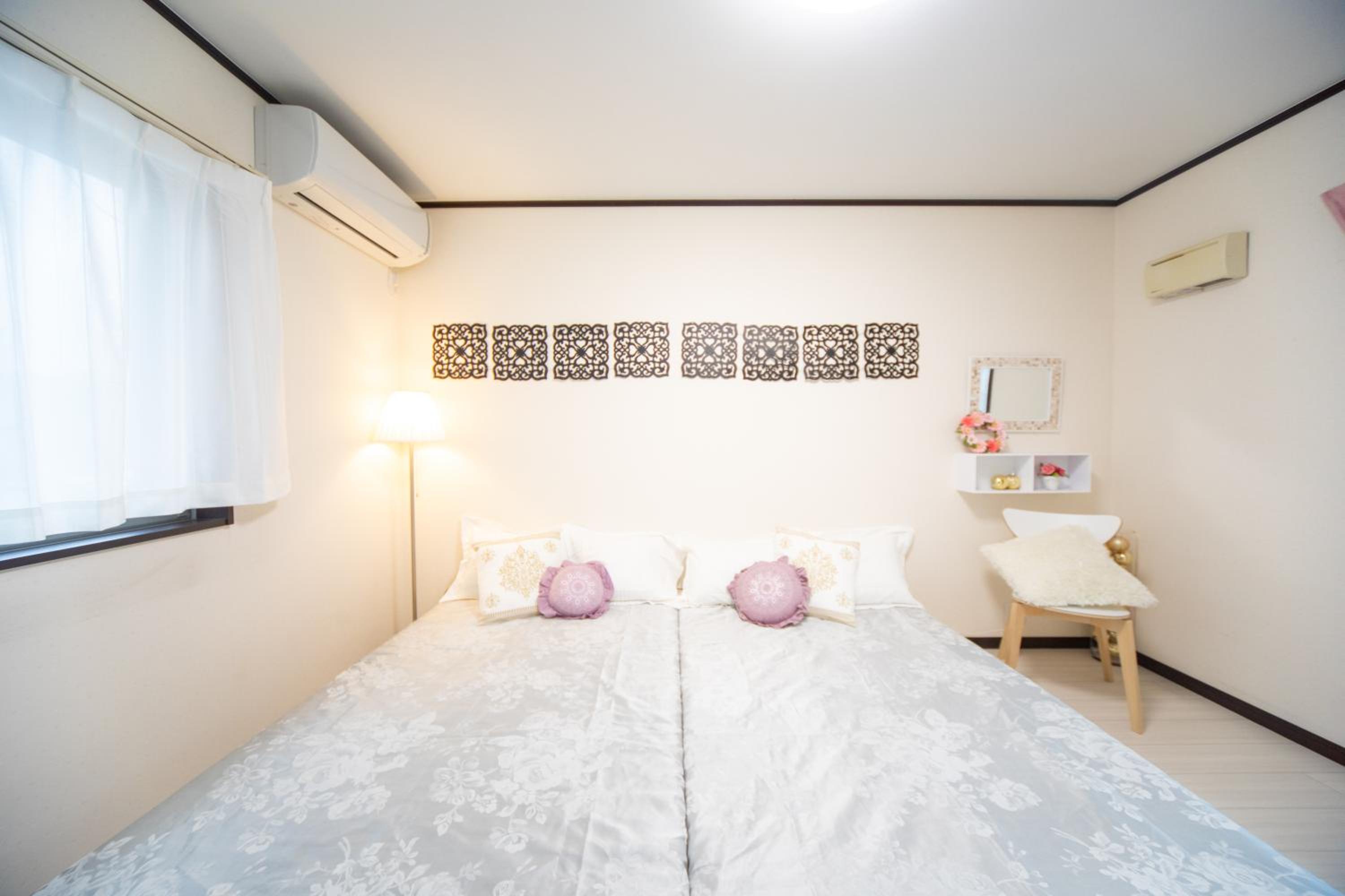 Three-Bedroom House - Photo 29