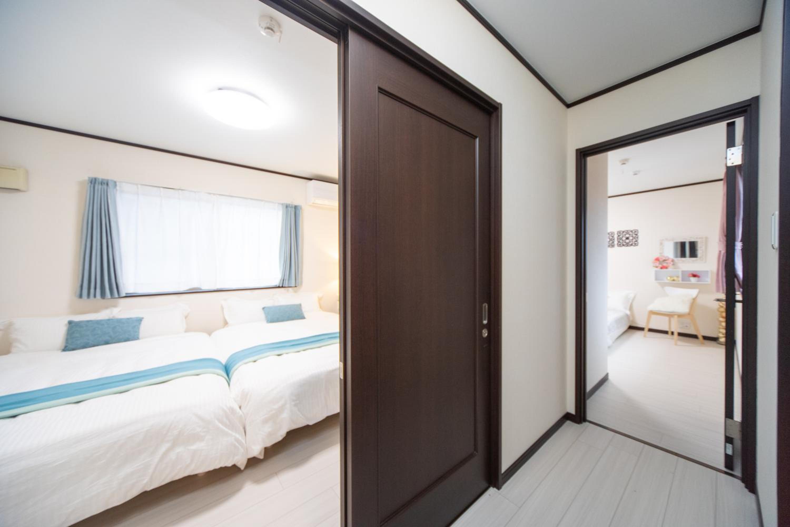 Three-Bedroom House - Photo 34