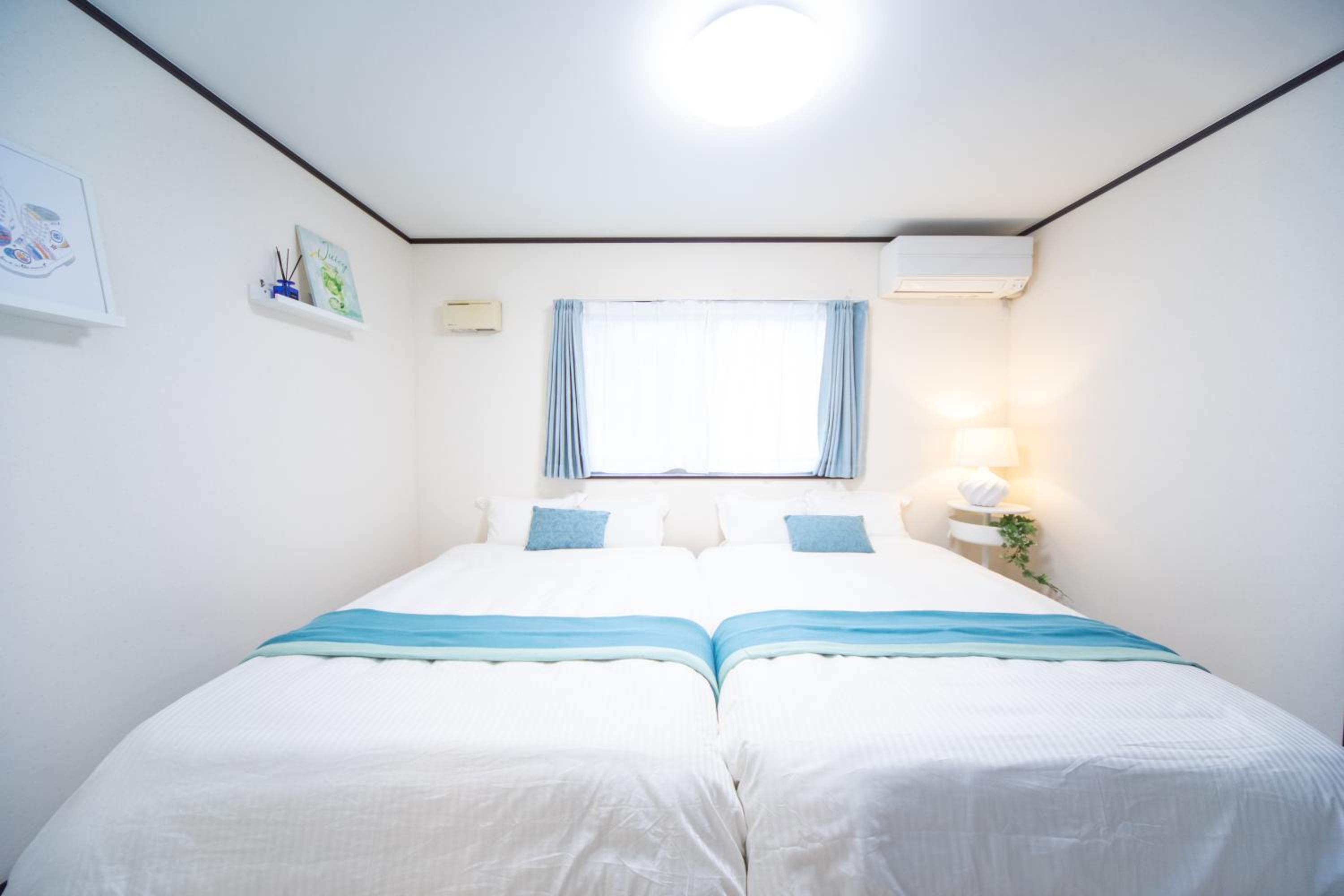 Three-Bedroom House - Photo 35