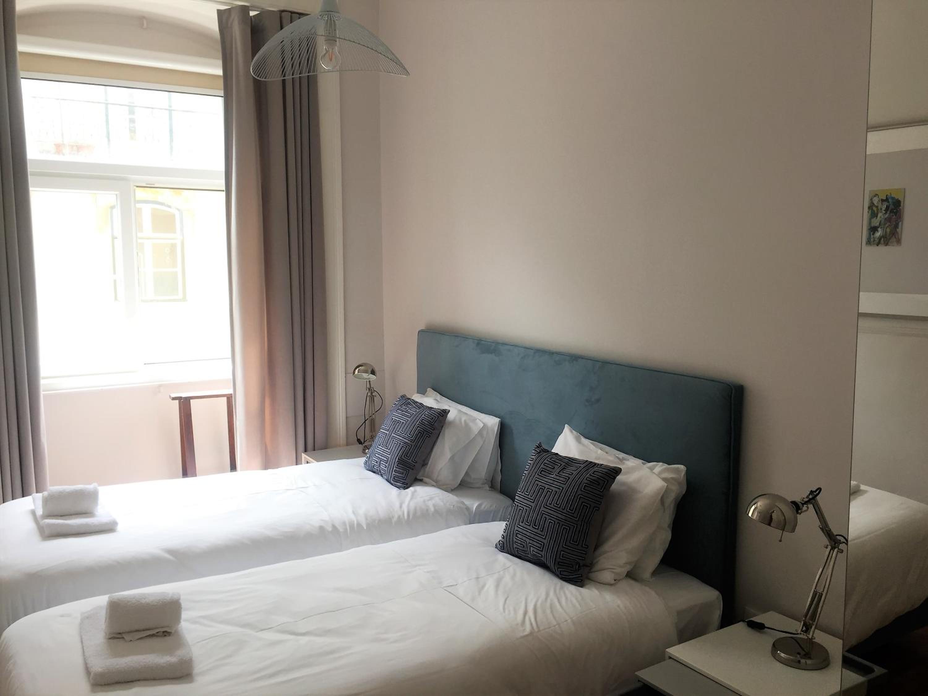 Three-Bedroom Apartment - Photo 10
