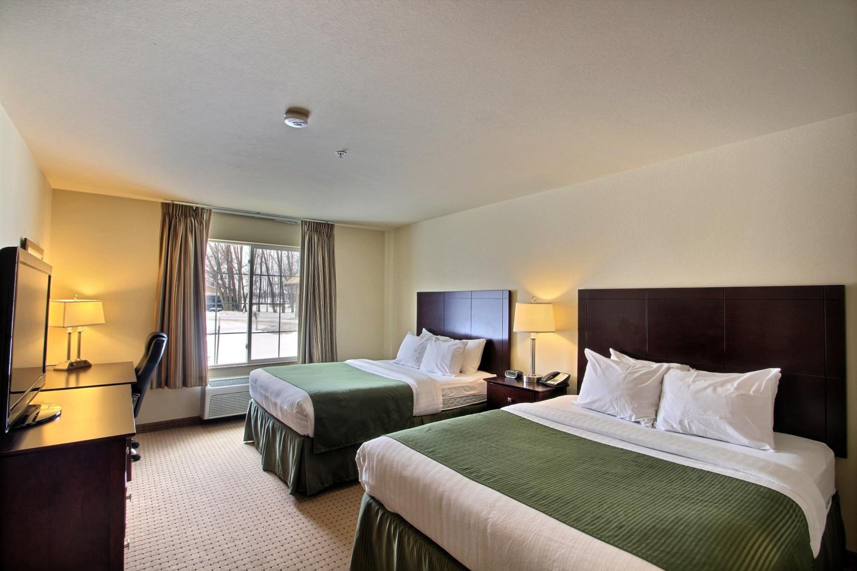 Queen Room with Two Queen Beds - Photo 1