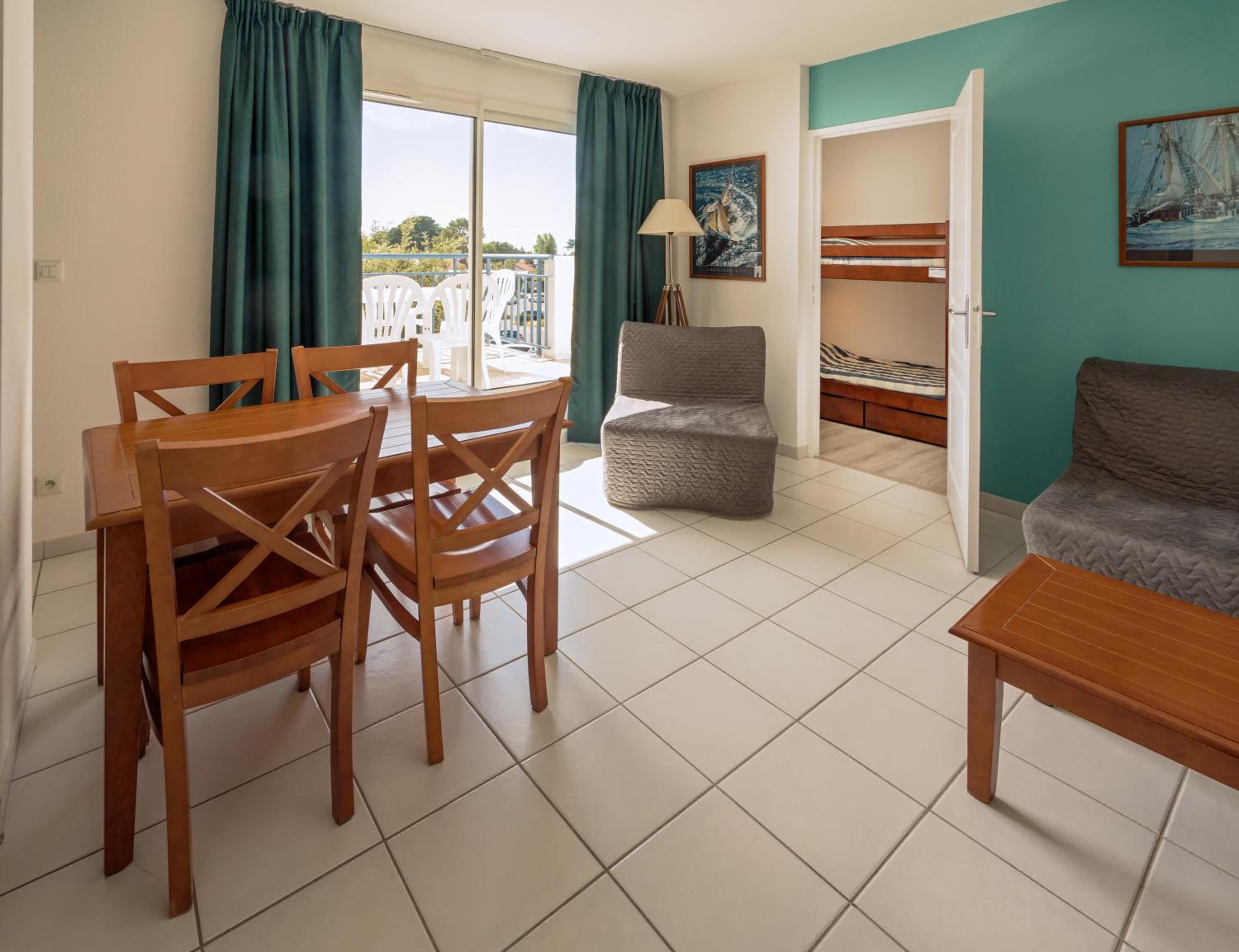 One-Bedroom Apartment with Alcove (2 Adults + 2 Children)