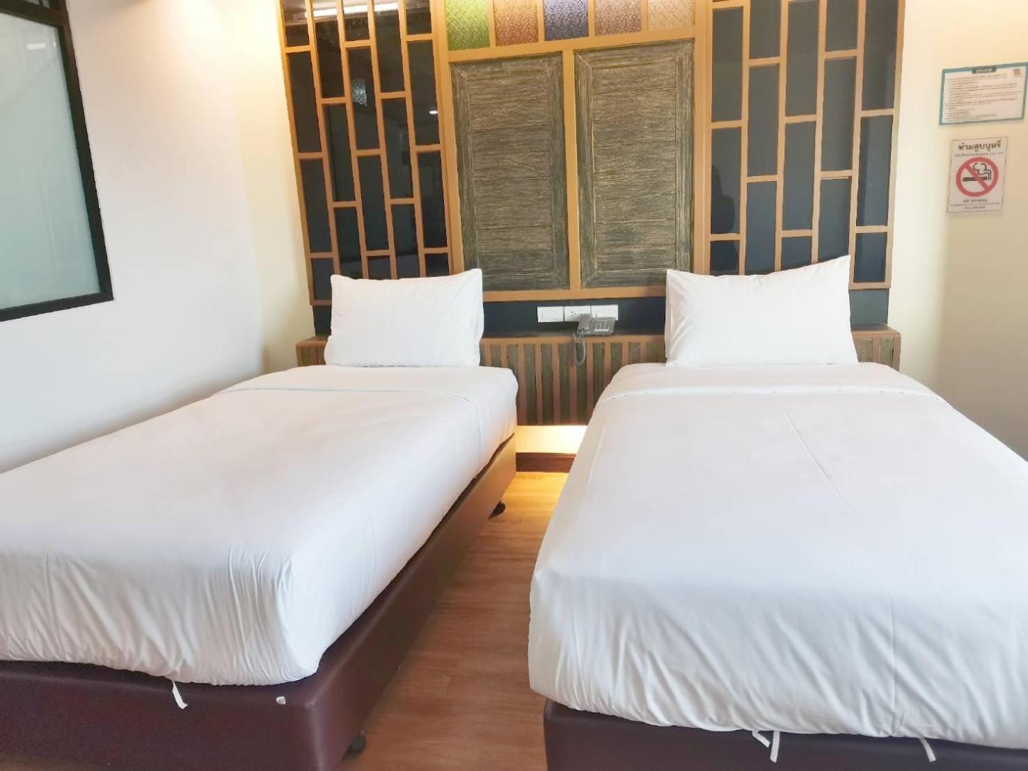 Standard Twin Room - Photo 7