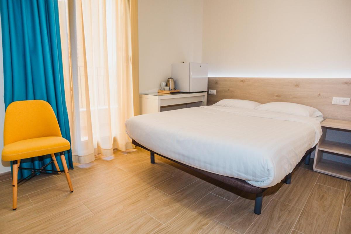 Habitación Triple con Balcón