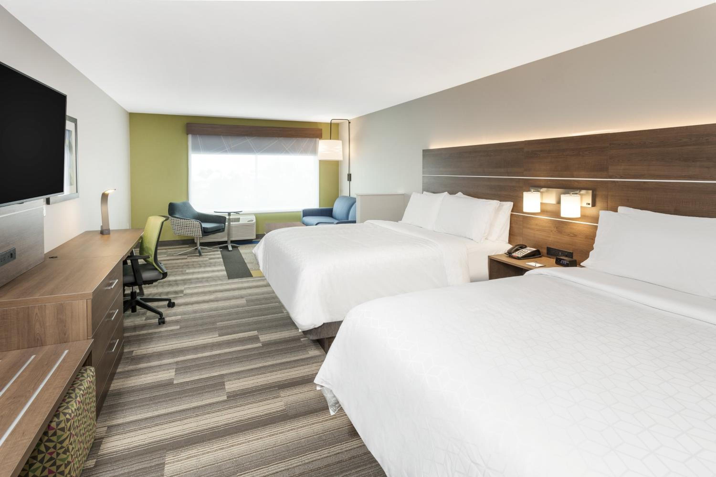 Queen Suite with Two Queen Beds and Sofa Bed - Photo 1