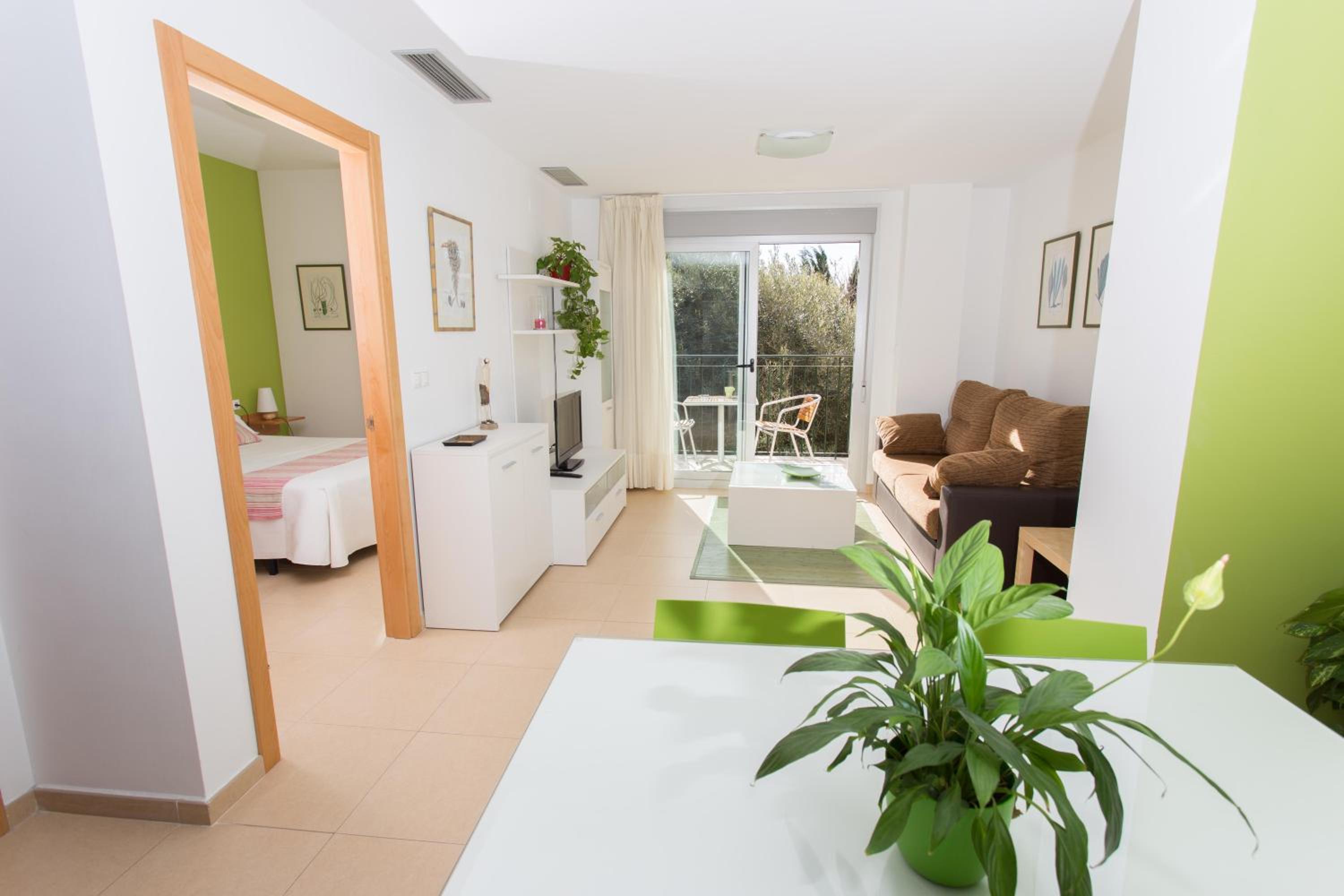 Apartamento familiar con terraza (2 adultos + 2 niños)