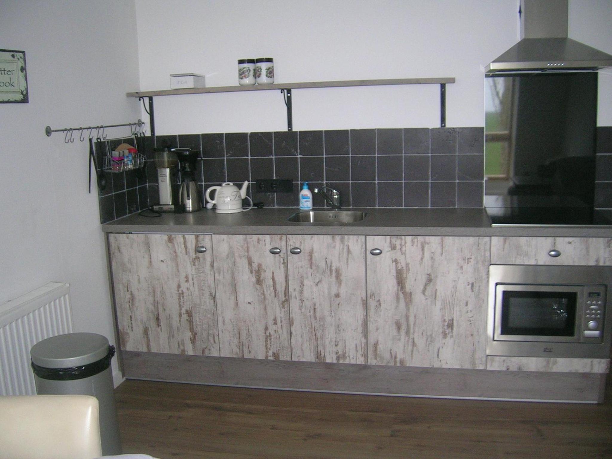 One-Bedroom Apartment with Balcony and Views photo 3