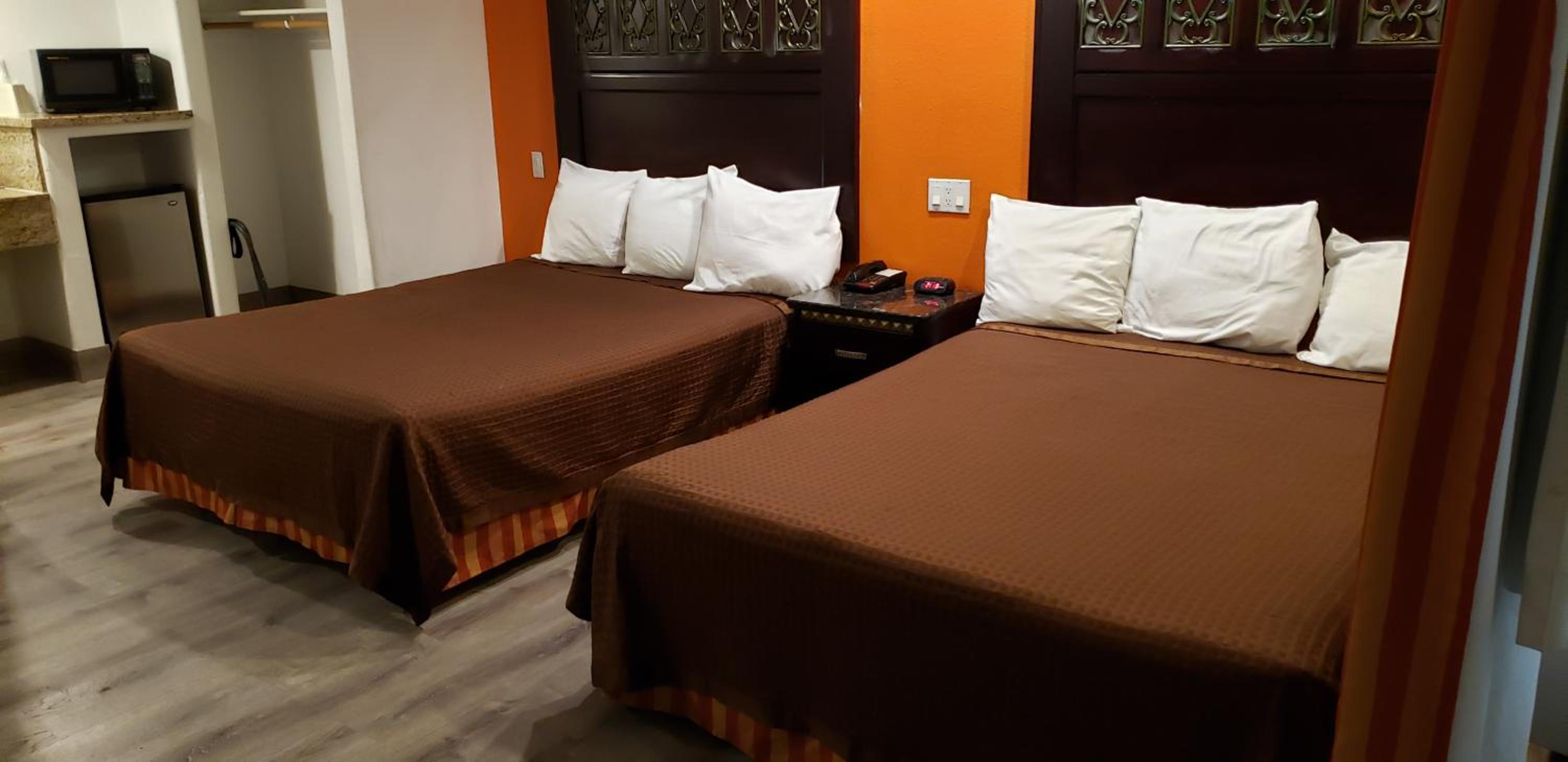 Queen Room with Two Queen Beds - Photo 1