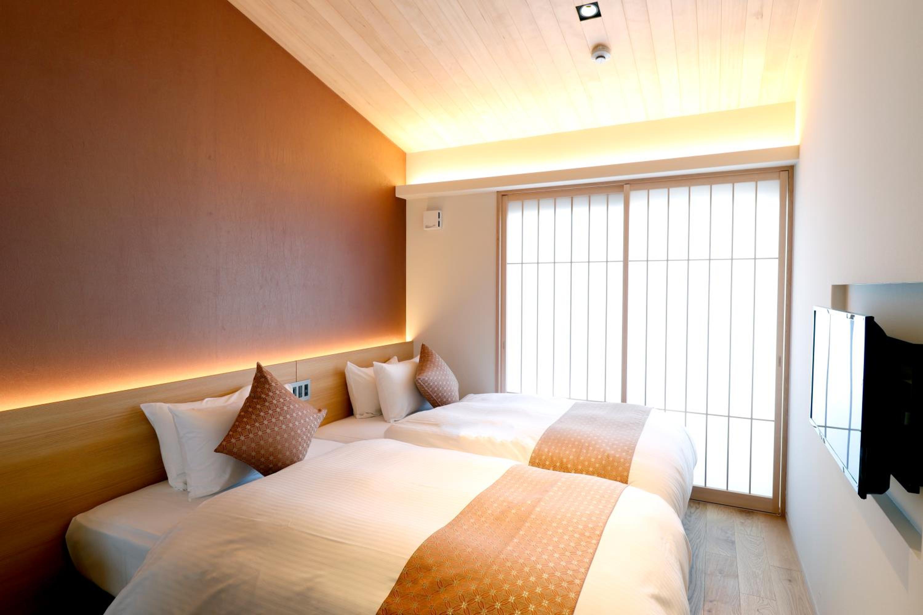 Standard Twin Room - Photo 4