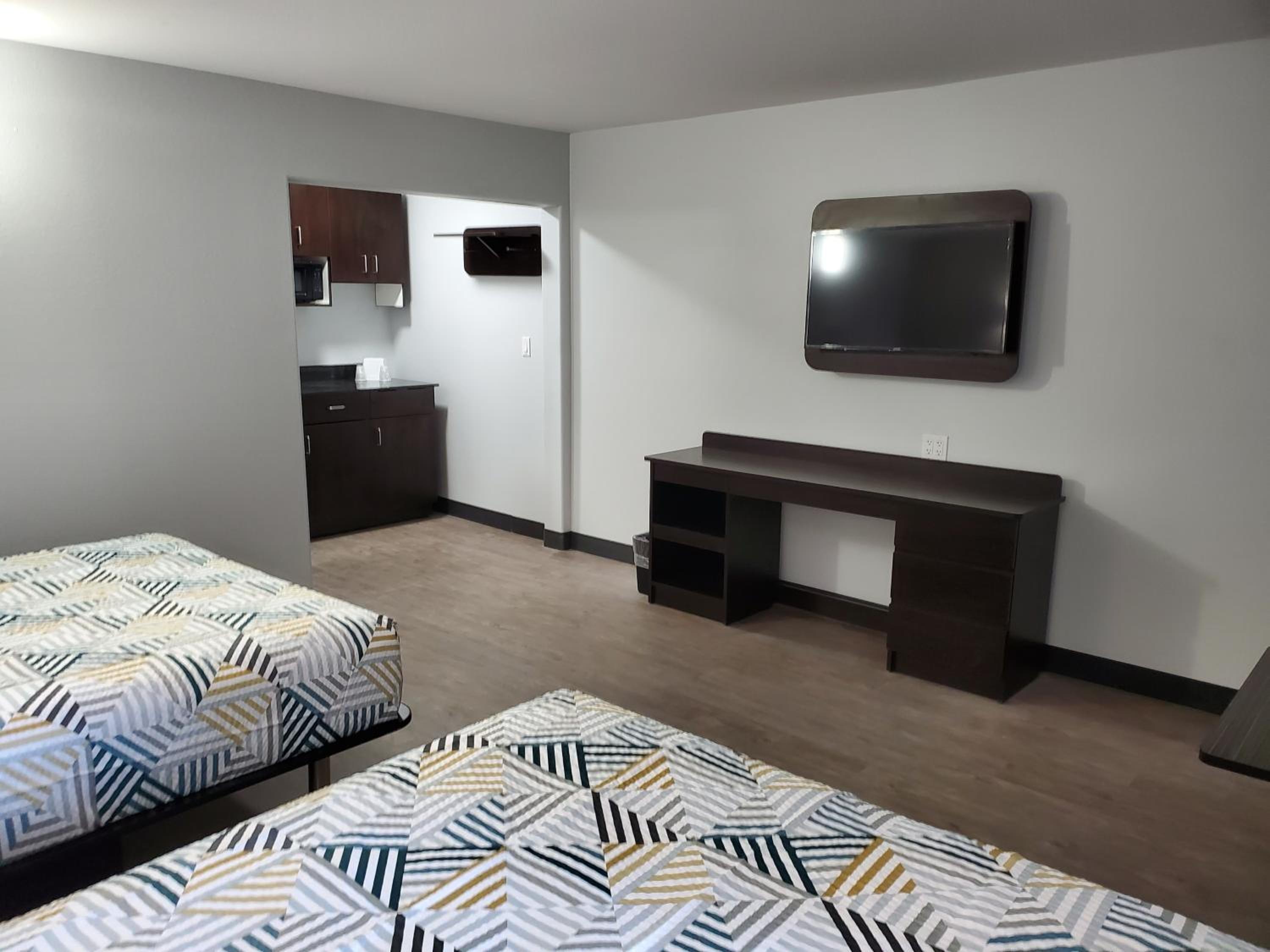 Deluxe Queen Room with Two Queen Beds - Photo 1