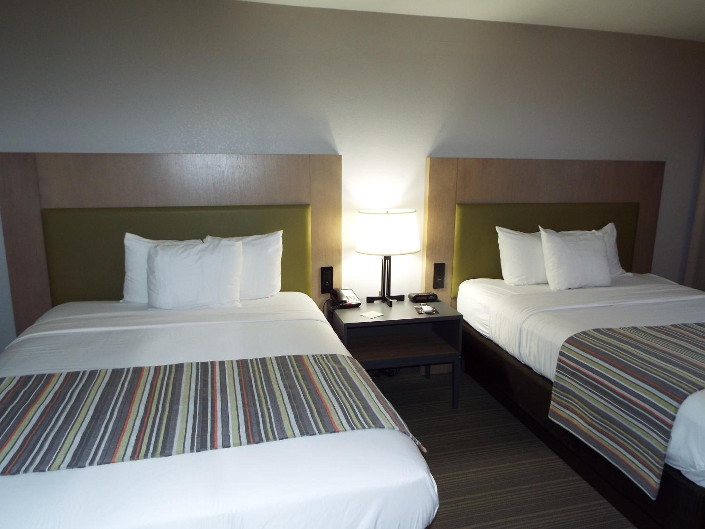 Queen Room with Two Queen Beds - Non-Smoking - Photo 1