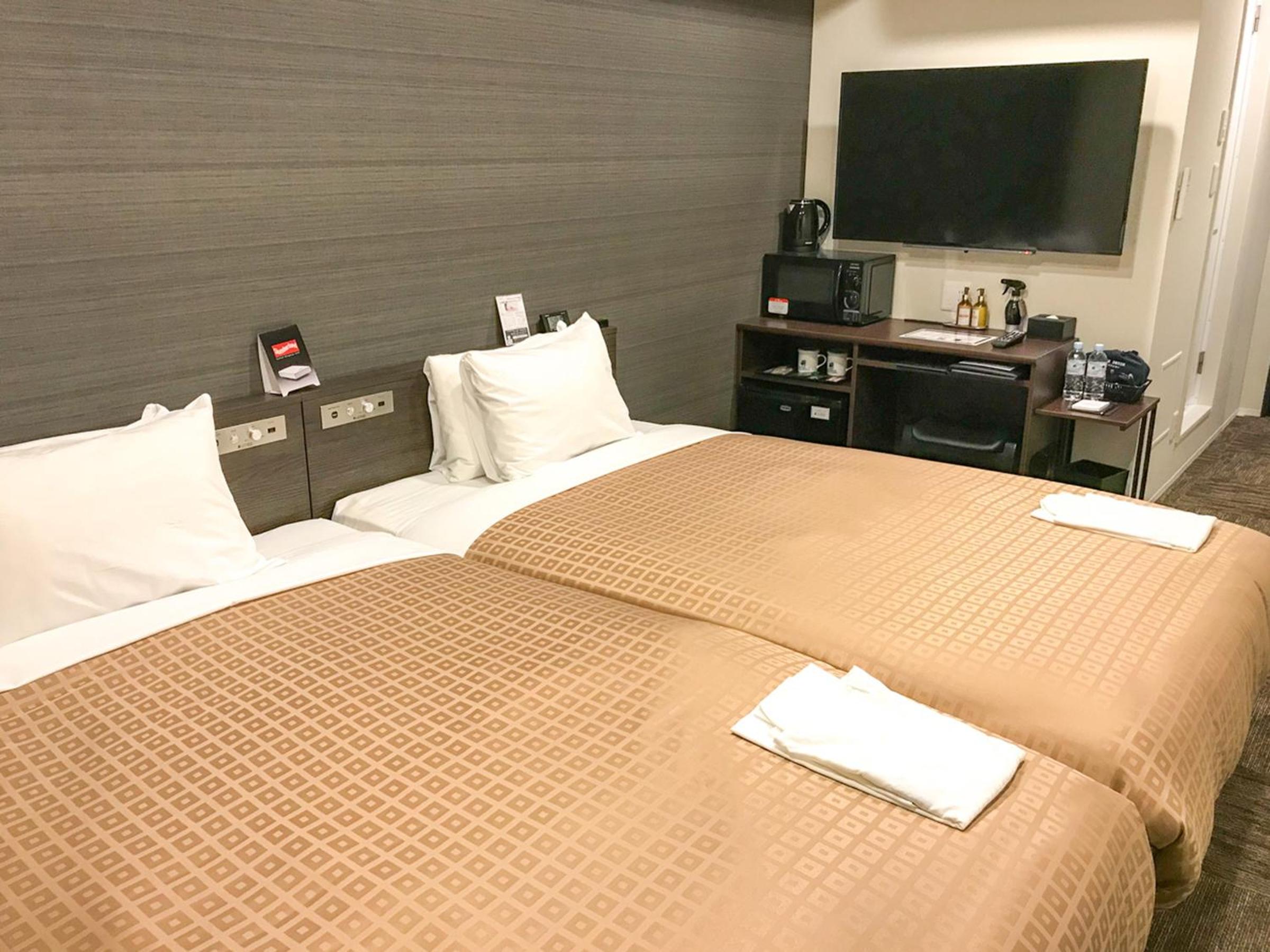 Twin Room - Non-Smoking - Photo 2