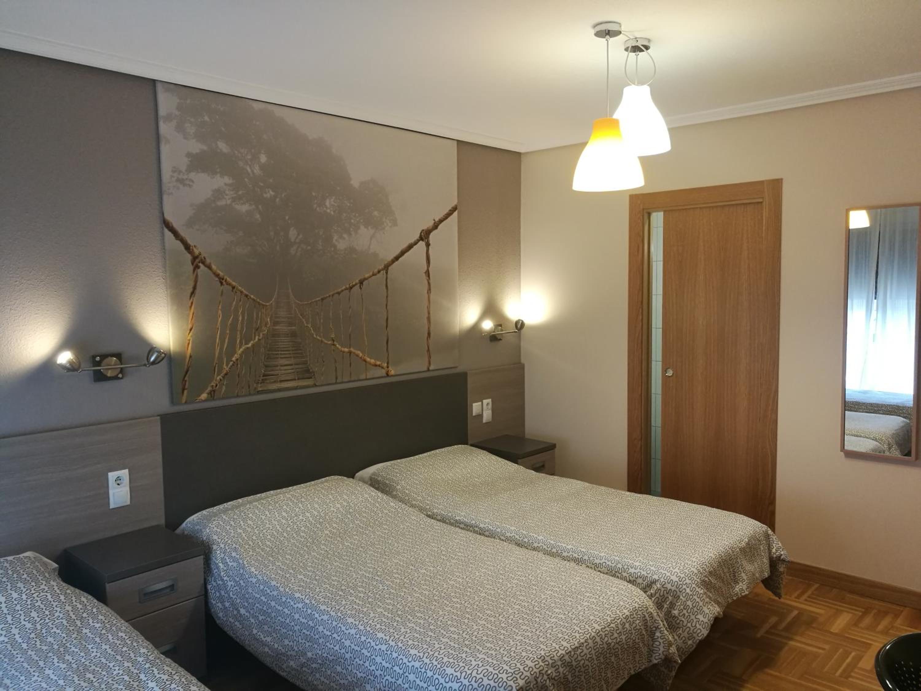 Habitación triple con baño