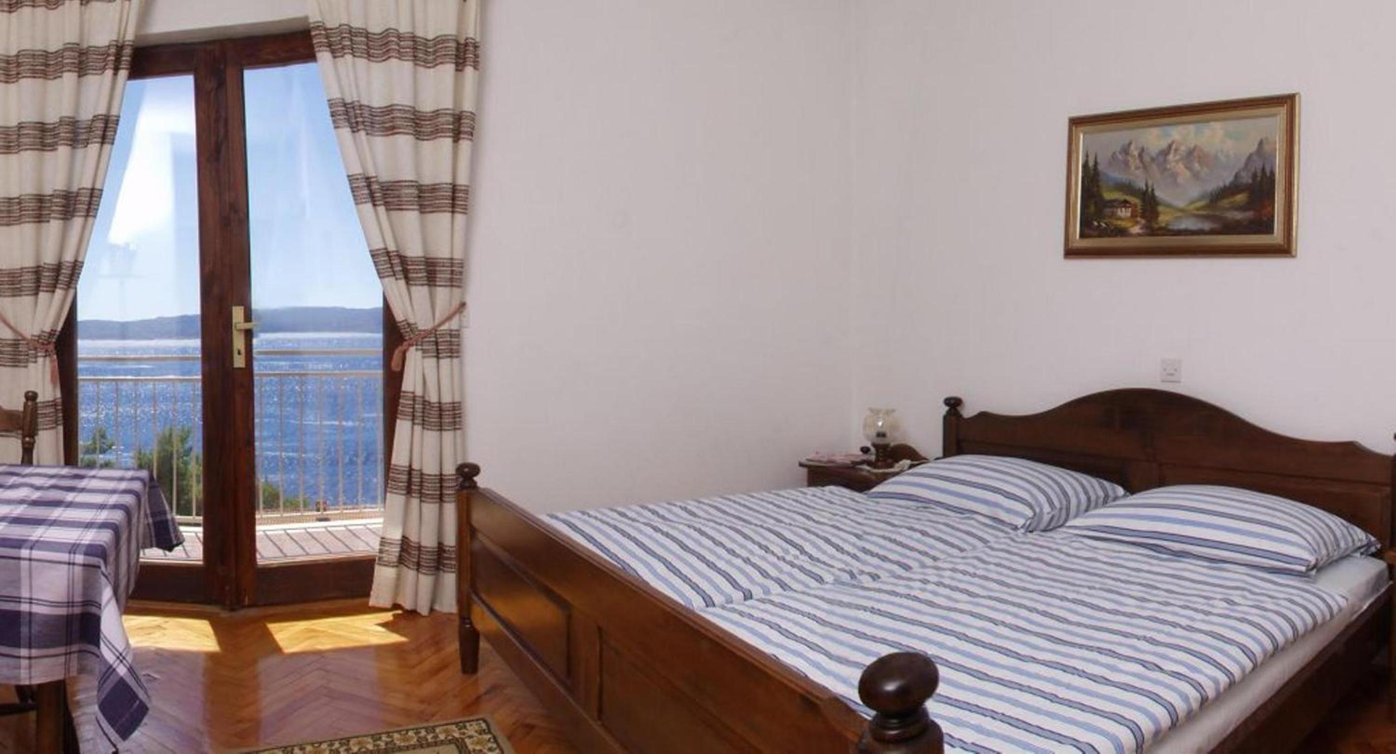 Three-Bedroom Apartment with Balcony and Sea View