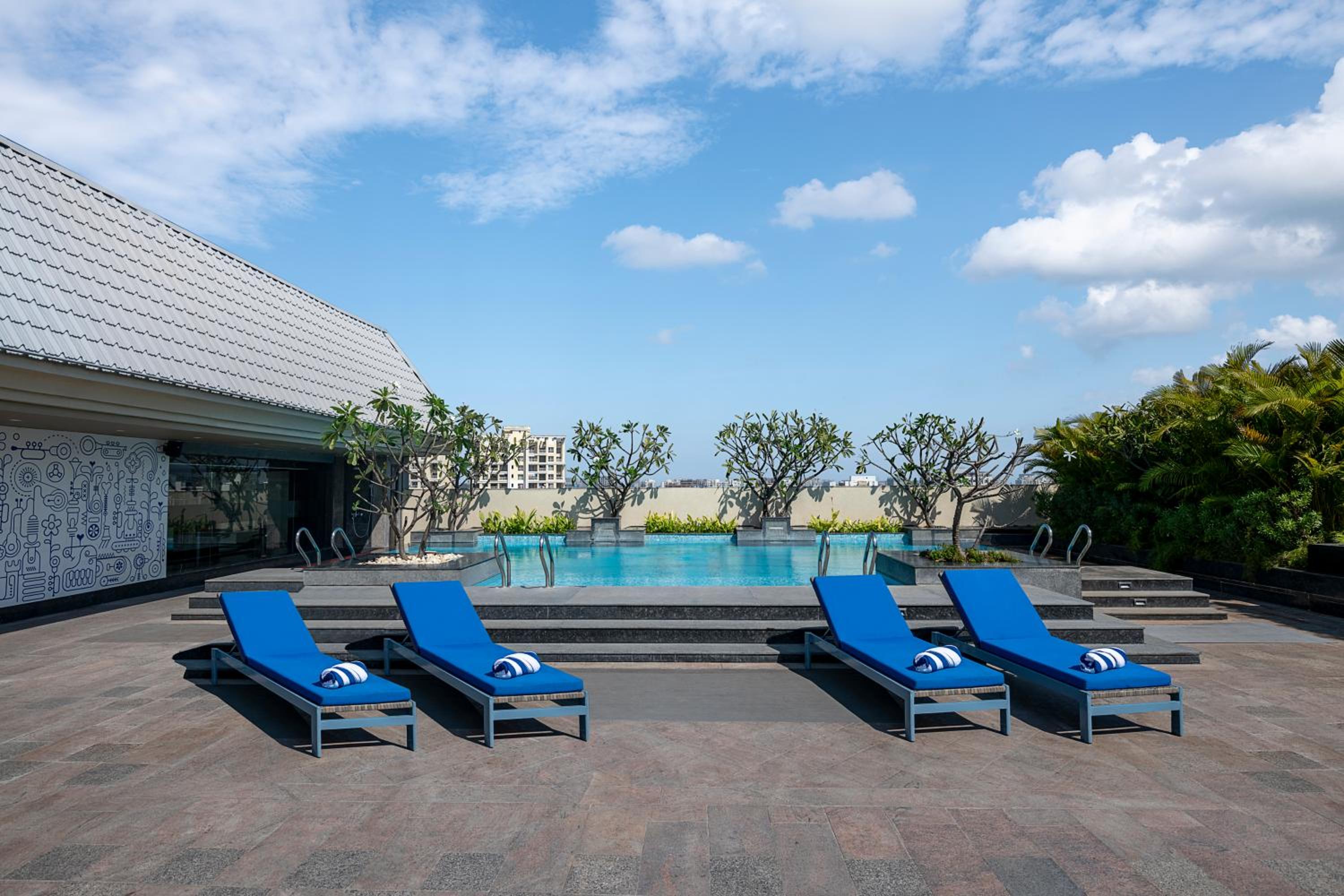 One-Bedroom Suite with INR 1000 beverage credit (min. spend ₹3,500), 20% off on F&B , 2 beers per stay and access to Business Lounge