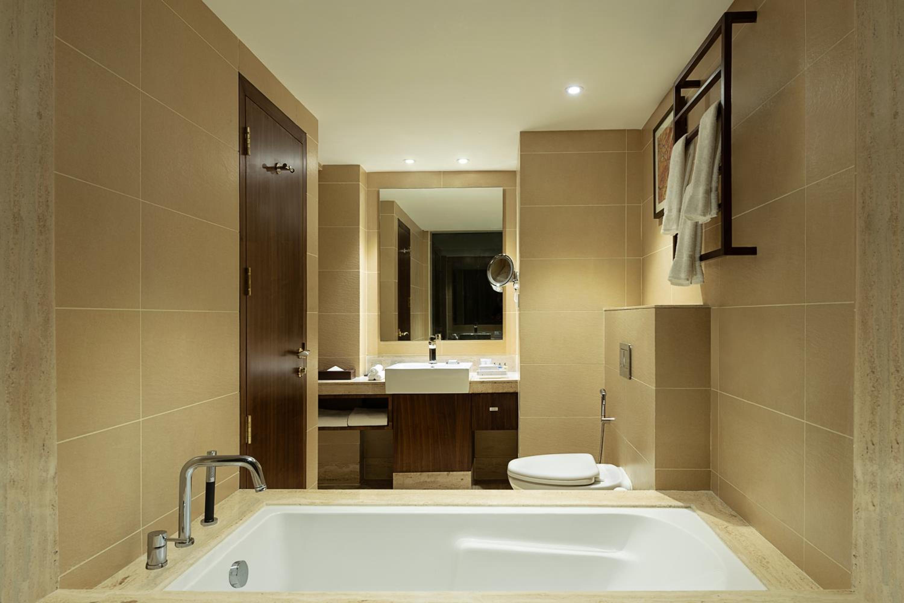 One-Bedroom Suite with INR 1000 beverage credit (min. spend ₹3,500), 20% off on F&B , 2 beers per stay and access to Business Lounge