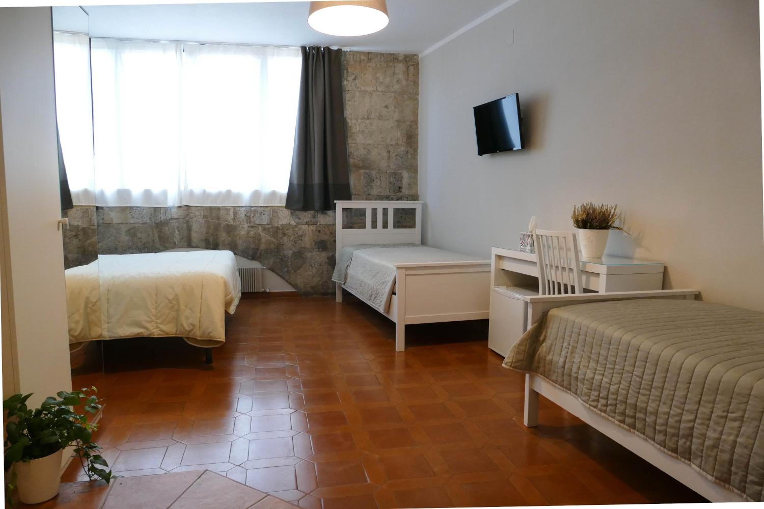 Quadruple Room with Private Bathroom photo 3