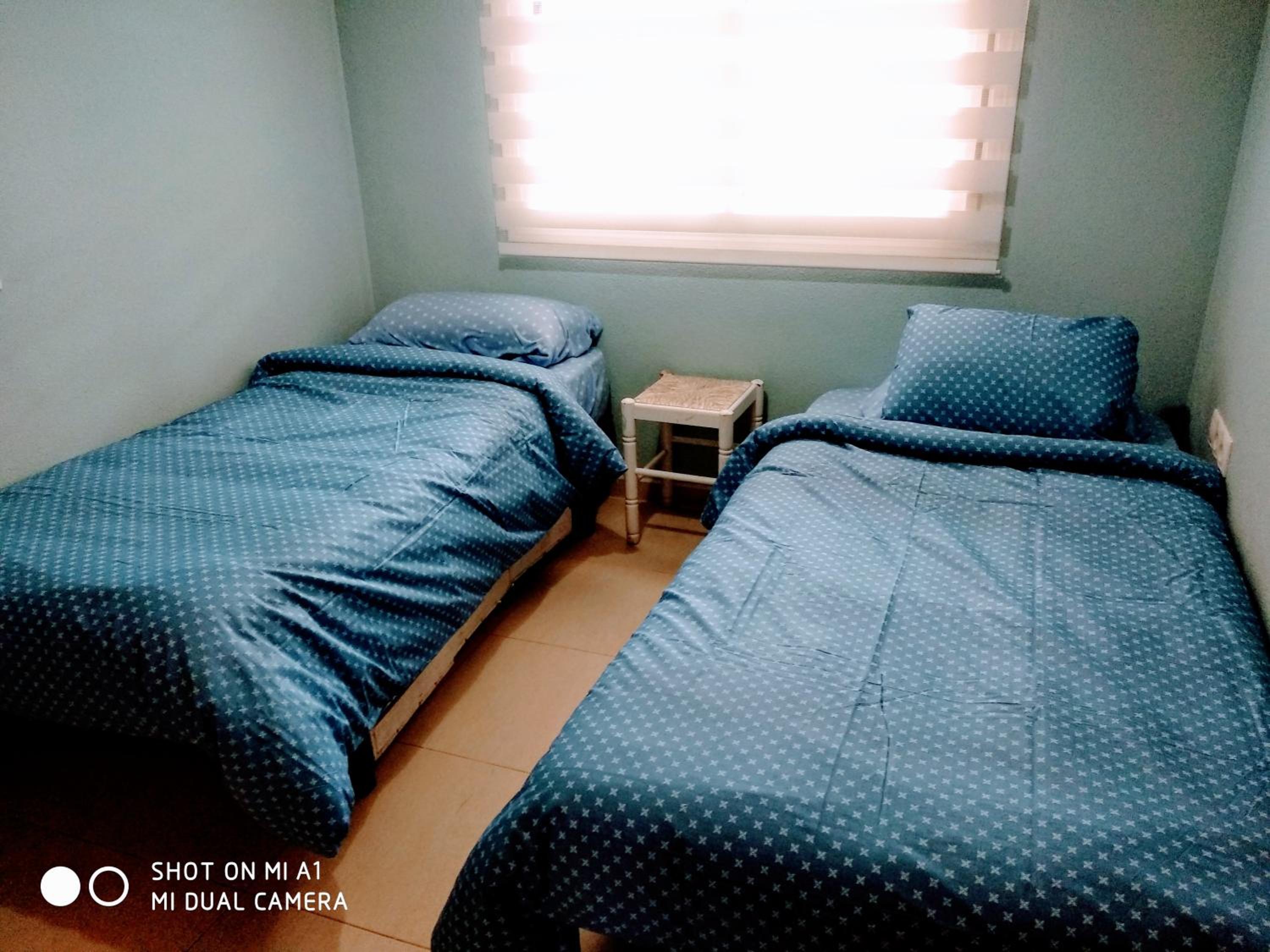 Three-Bedroom House - Photo 12