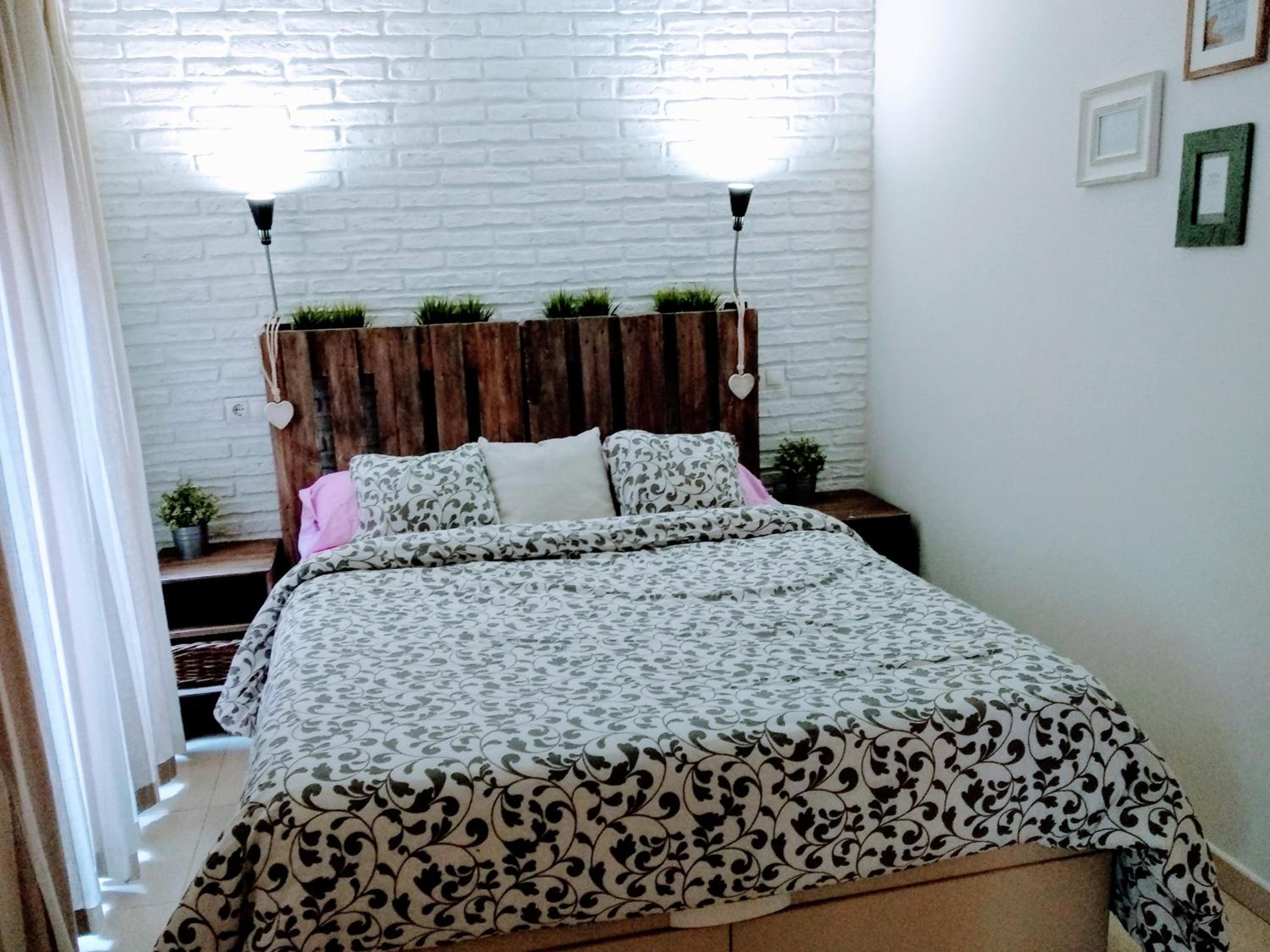 Three-Bedroom House - Photo 31