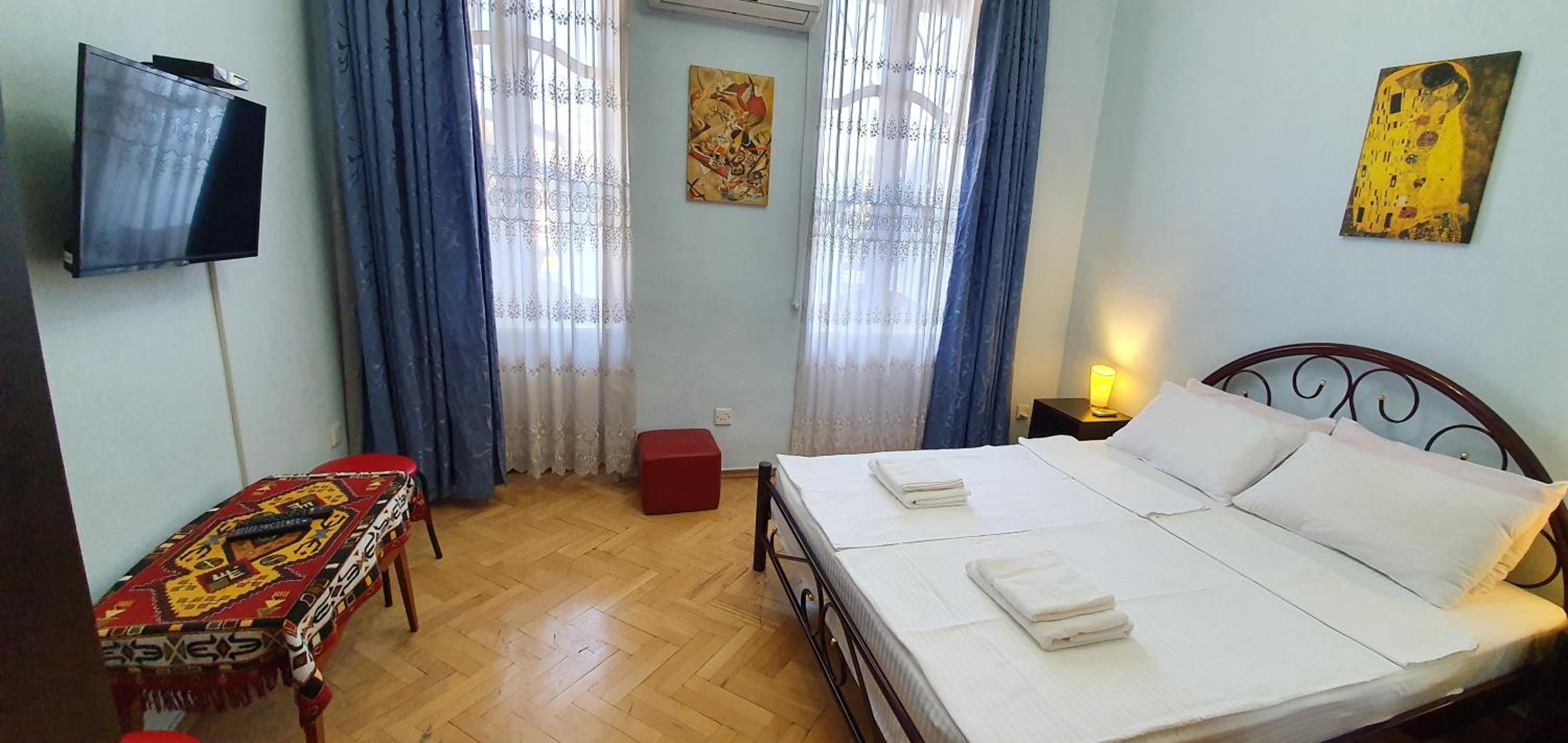 Three-Bedroom Apartment - Photo 8