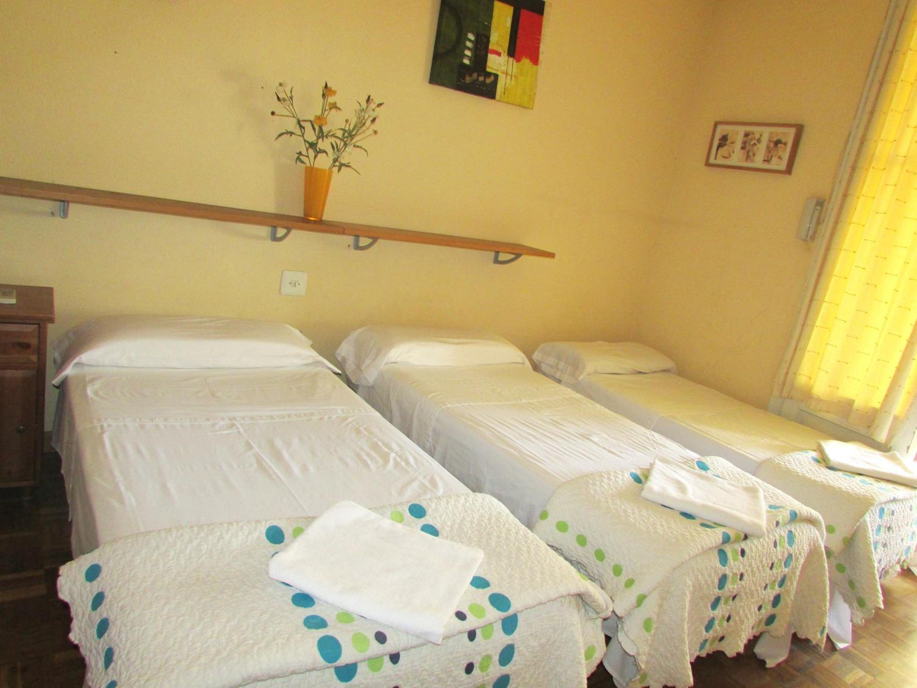 Habitación triple con terraza
