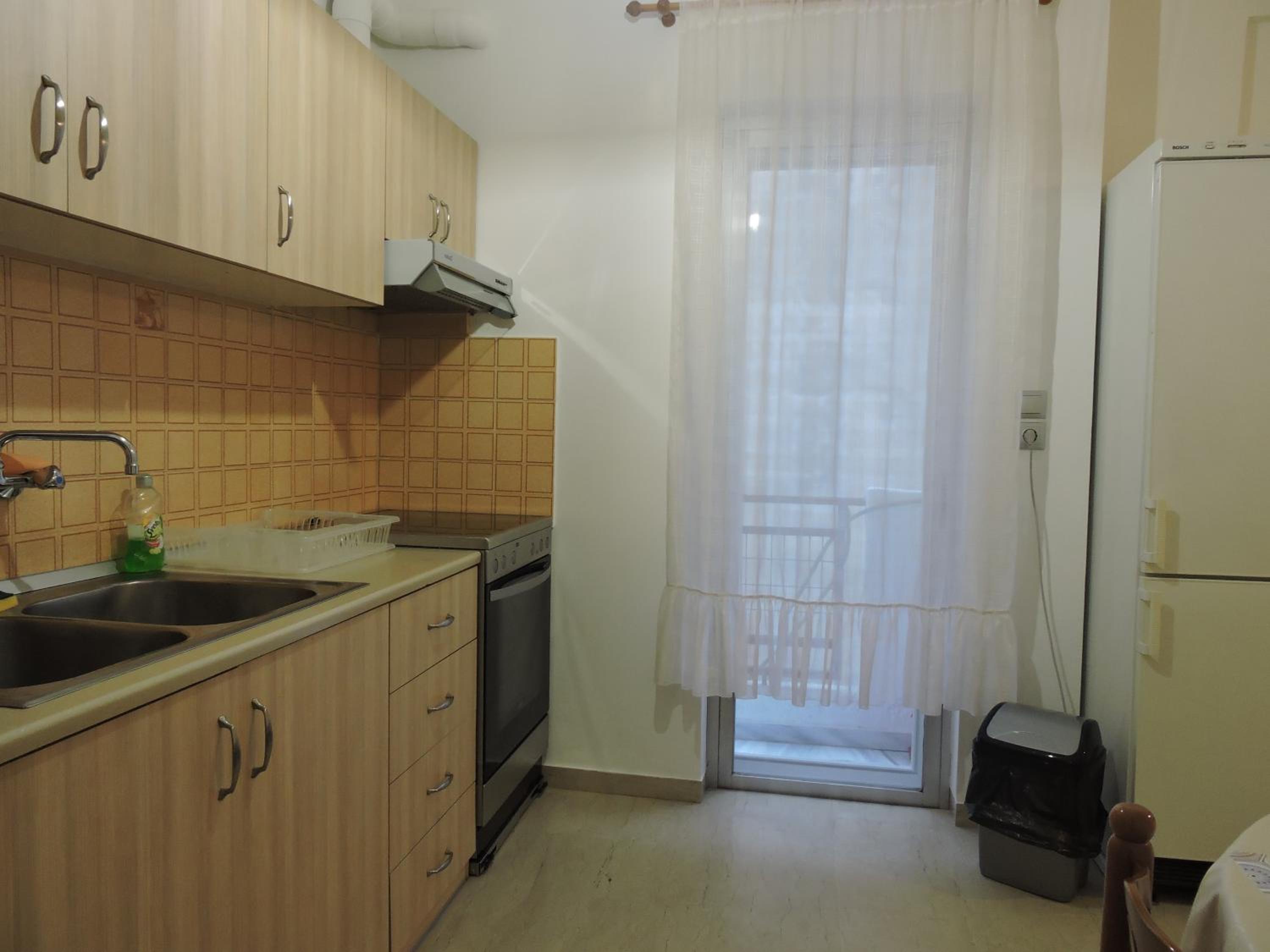 Three-Bedroom Apartment - Photo 12
