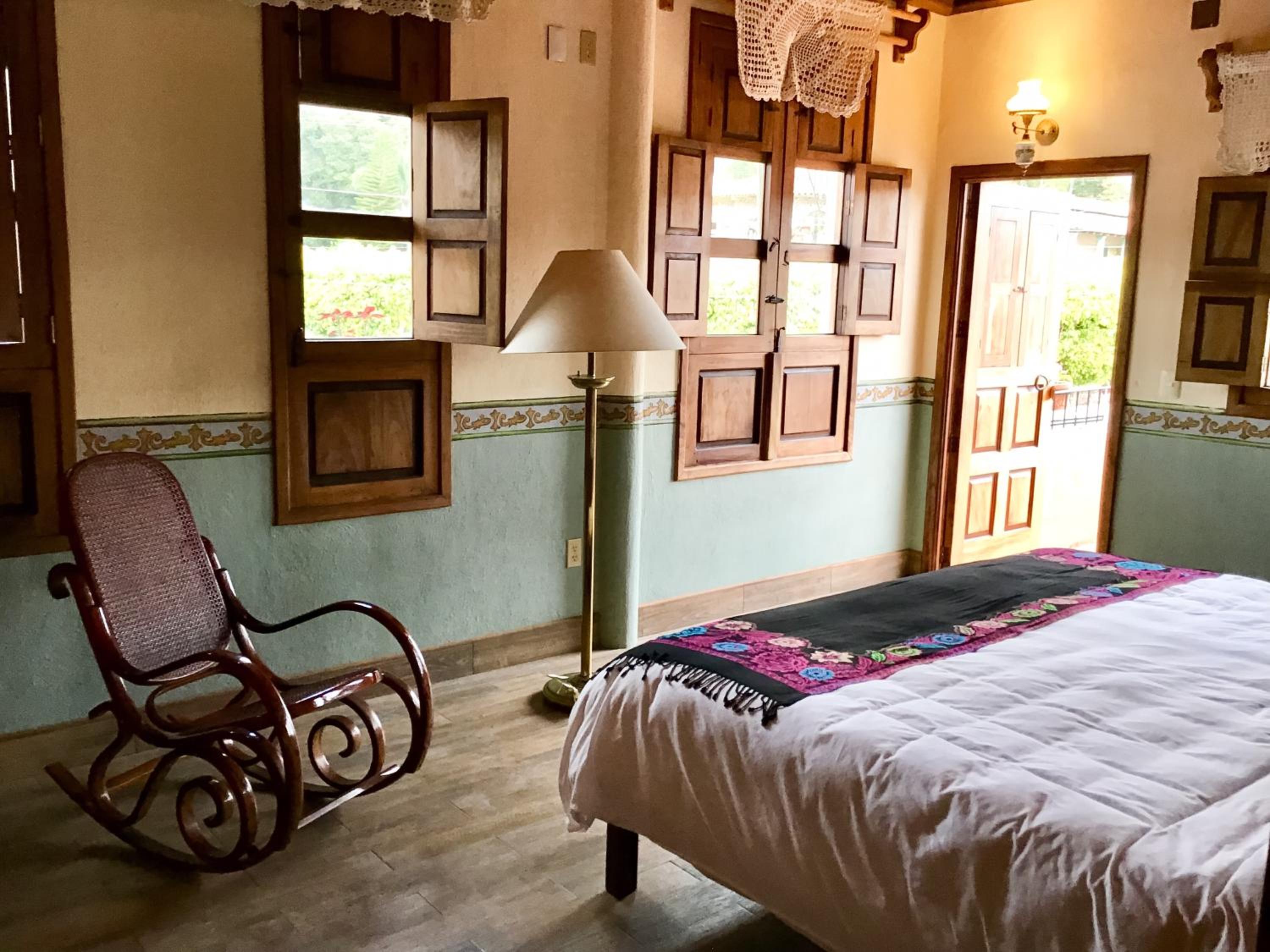 King Suite with Balcony - Photo 1