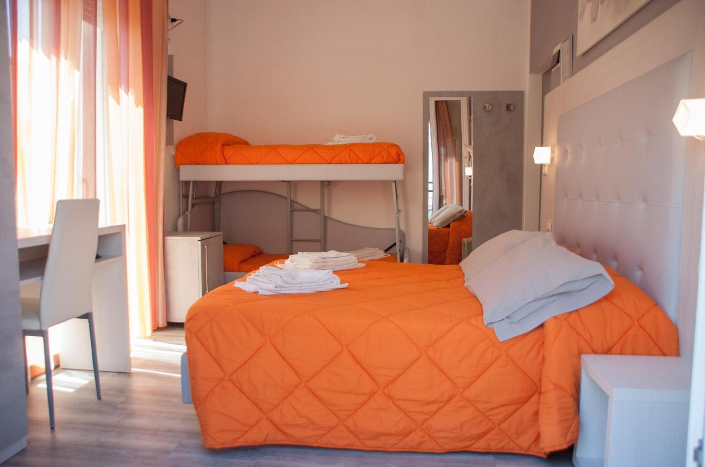 Quadruple Room with Balcony - Photo 1