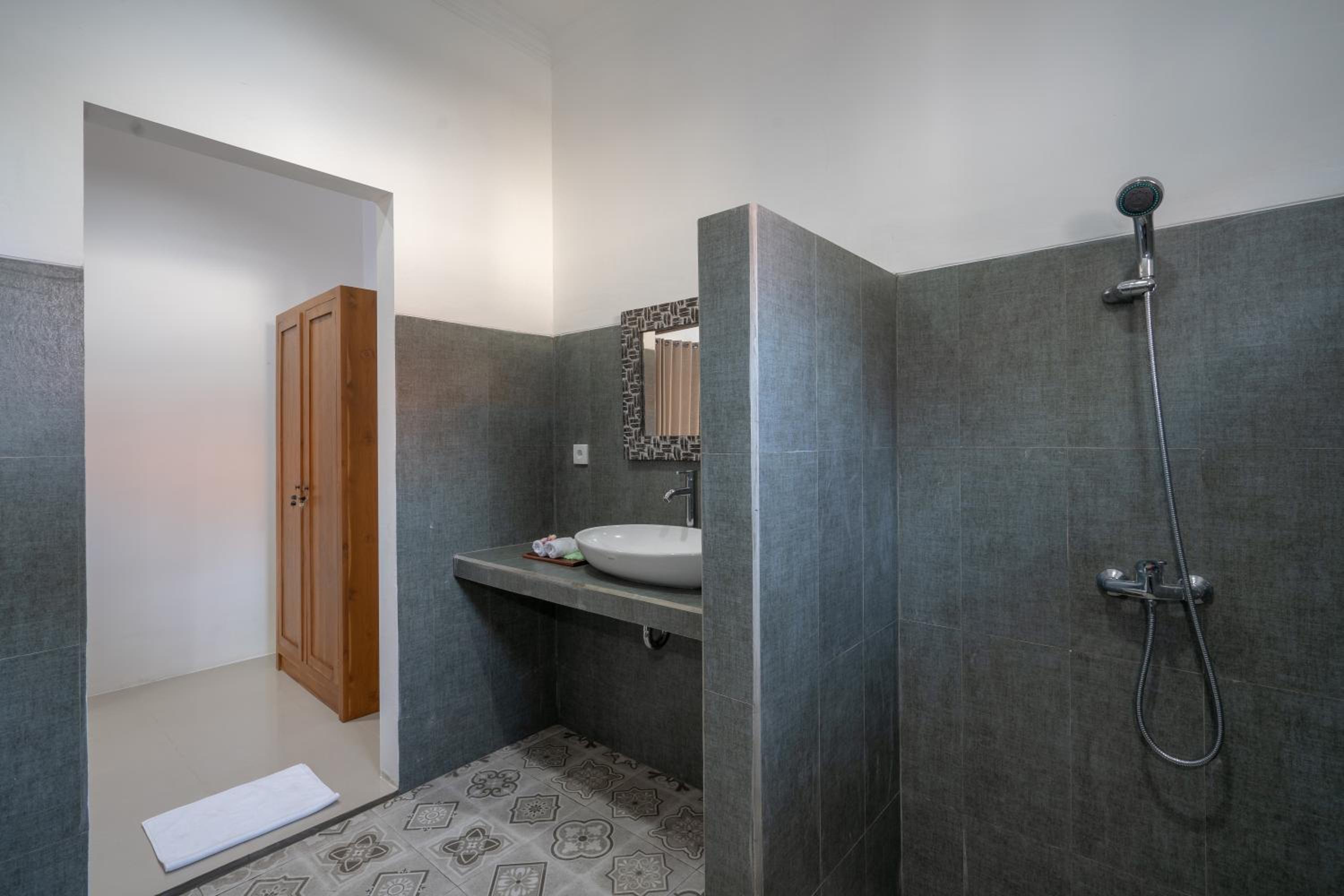 Deluxe Triple Room - Photo 8