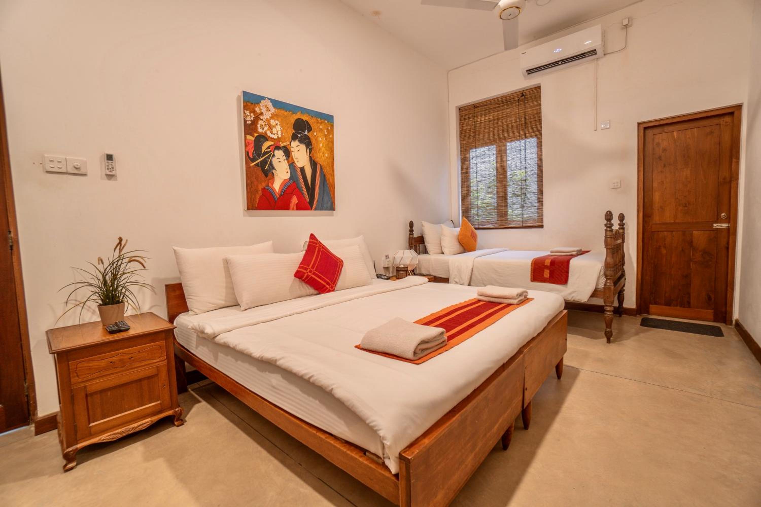 Deluxe Triple Room