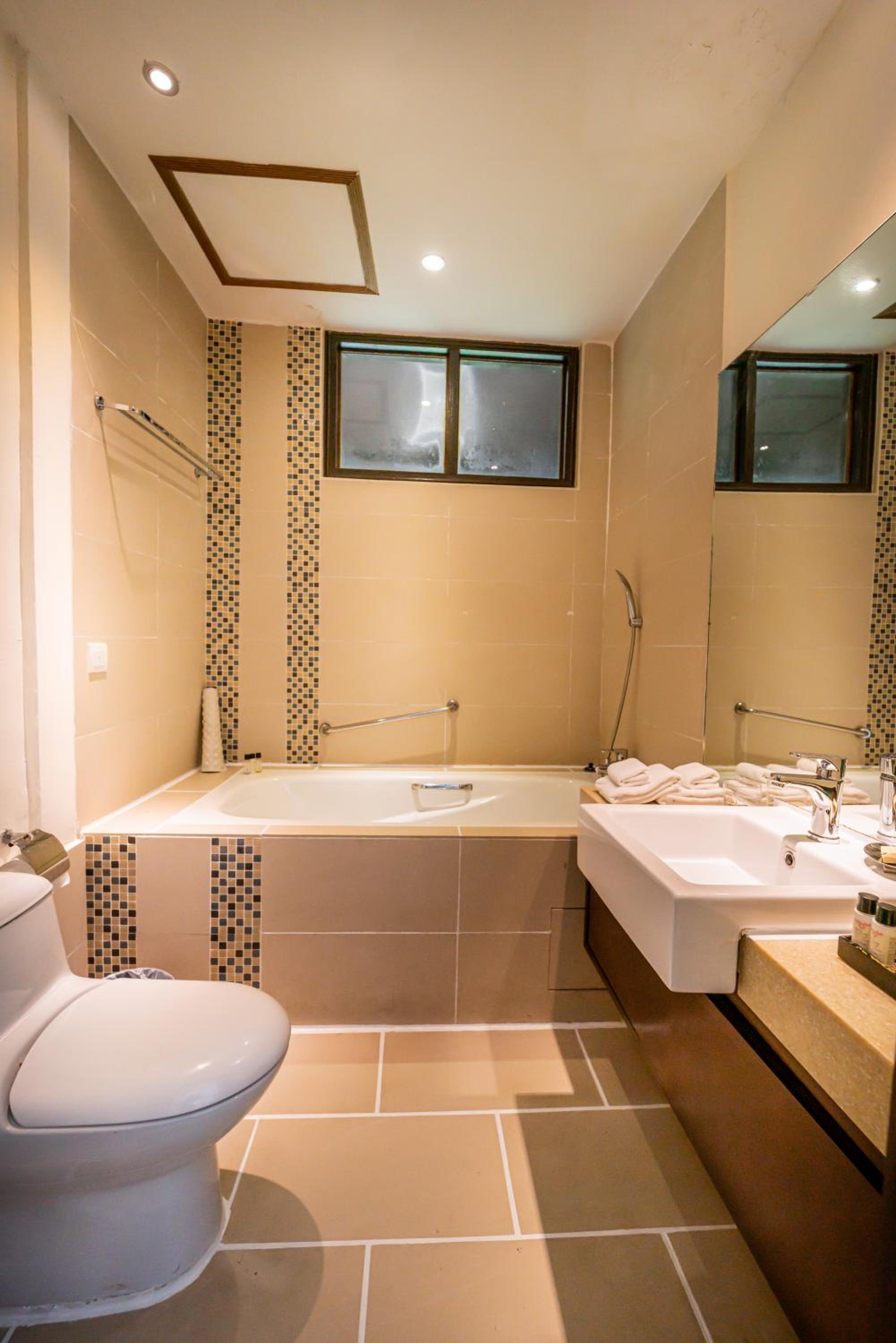 Two Bedroom Garden View Suite - Photo 18
