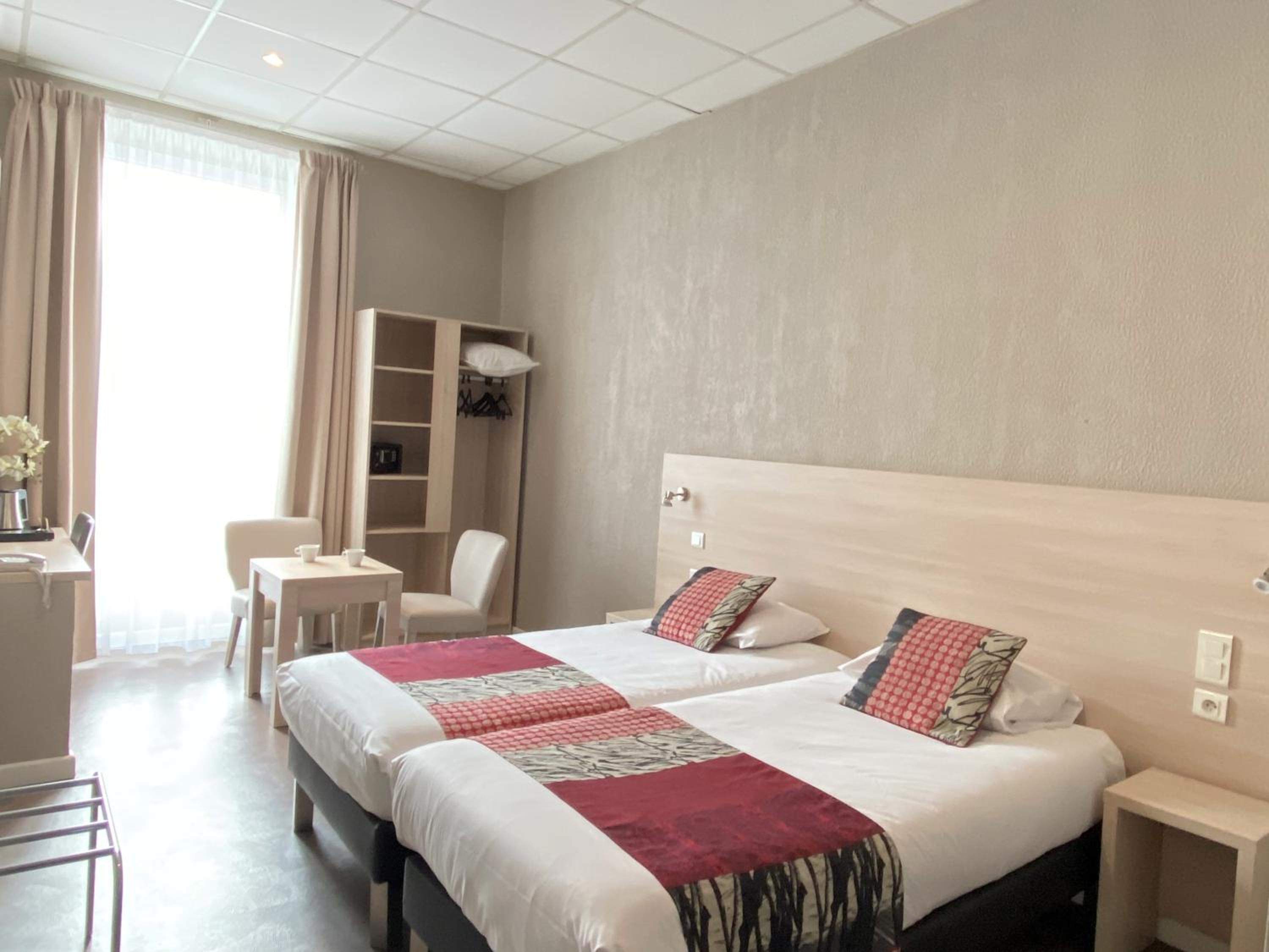 Twin Room - Photo 1
