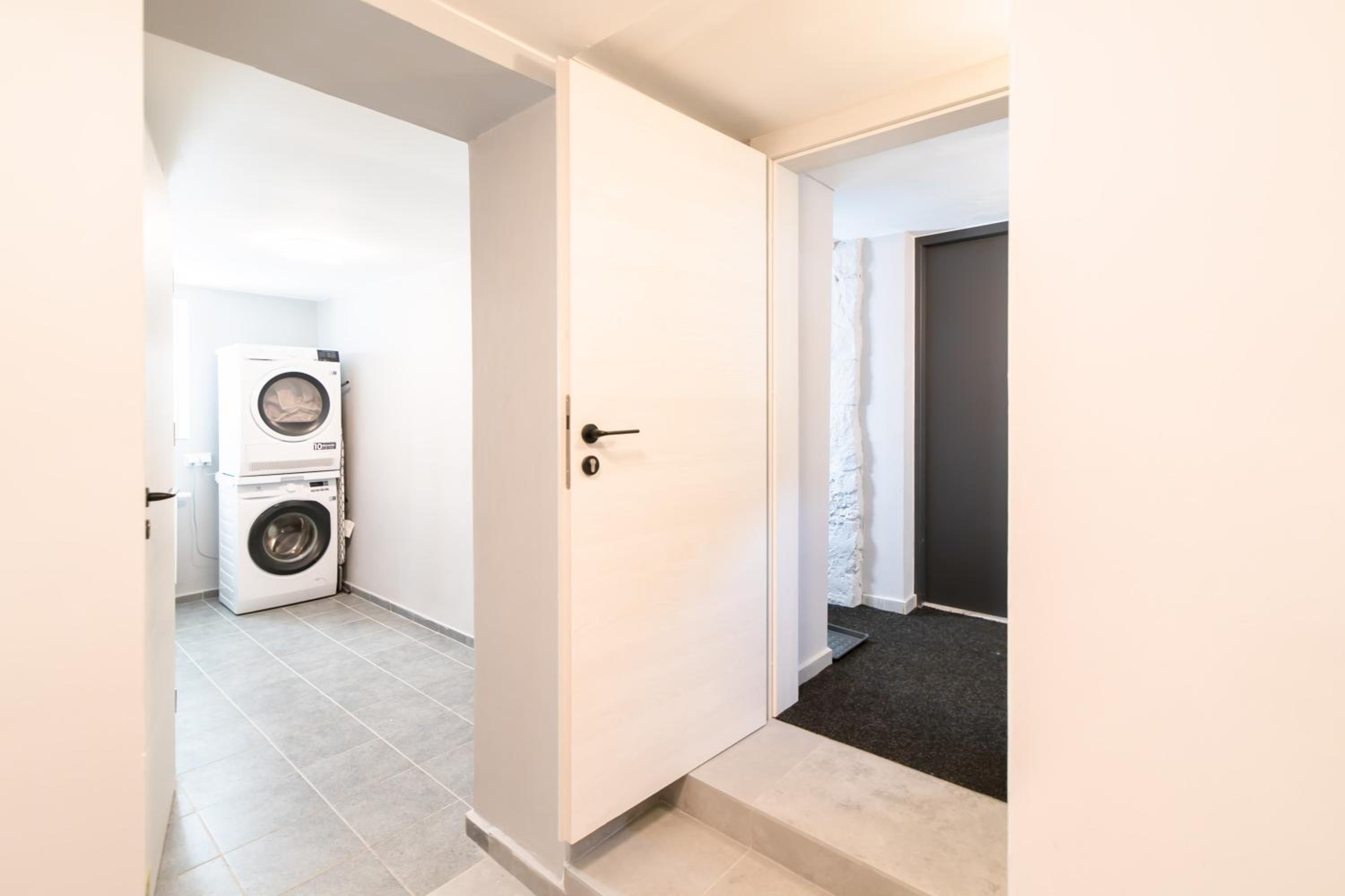 Three-Bedroom House - Photo 24