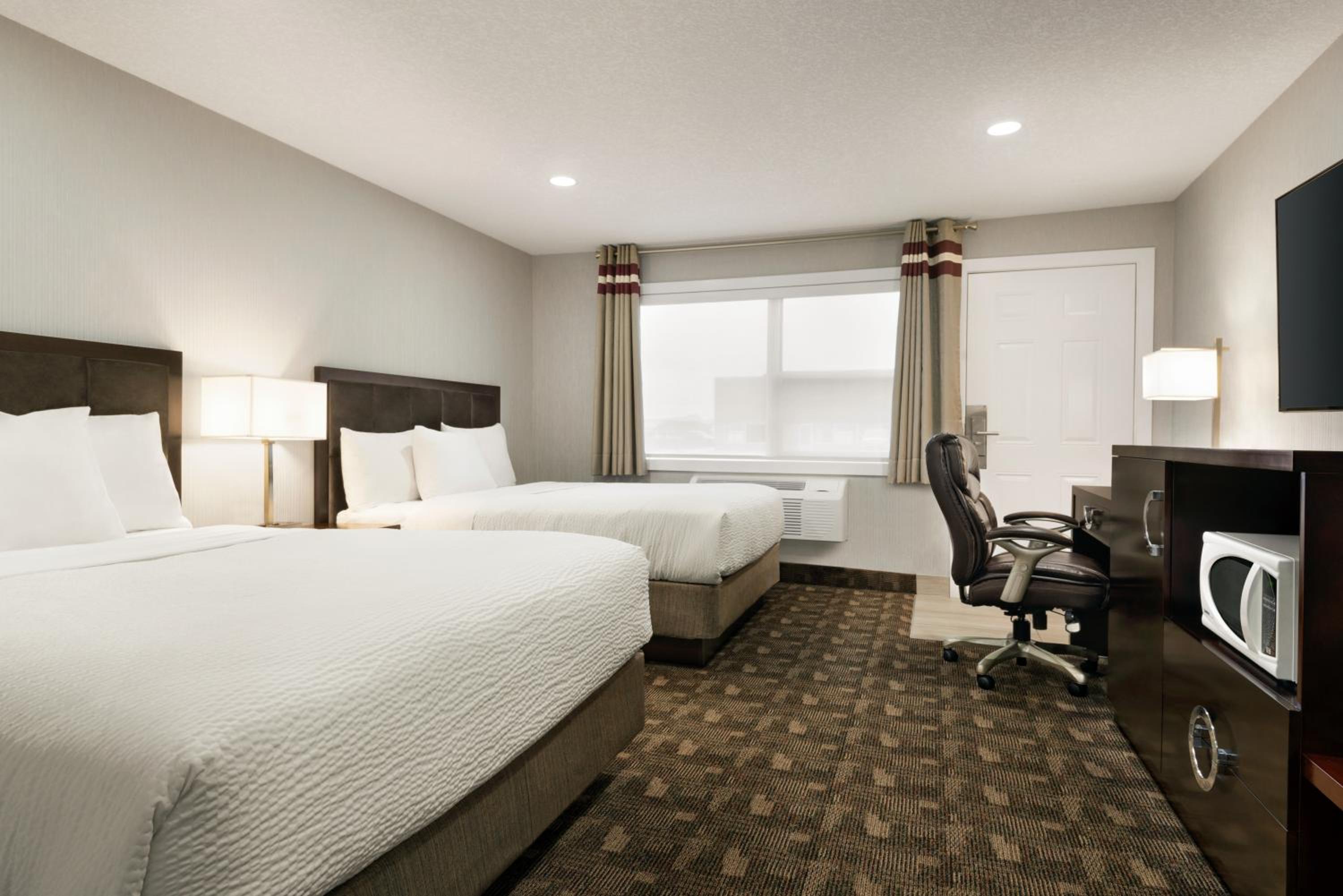 Queen Room with Two Queen Beds - Non-Smoking - Photo 1