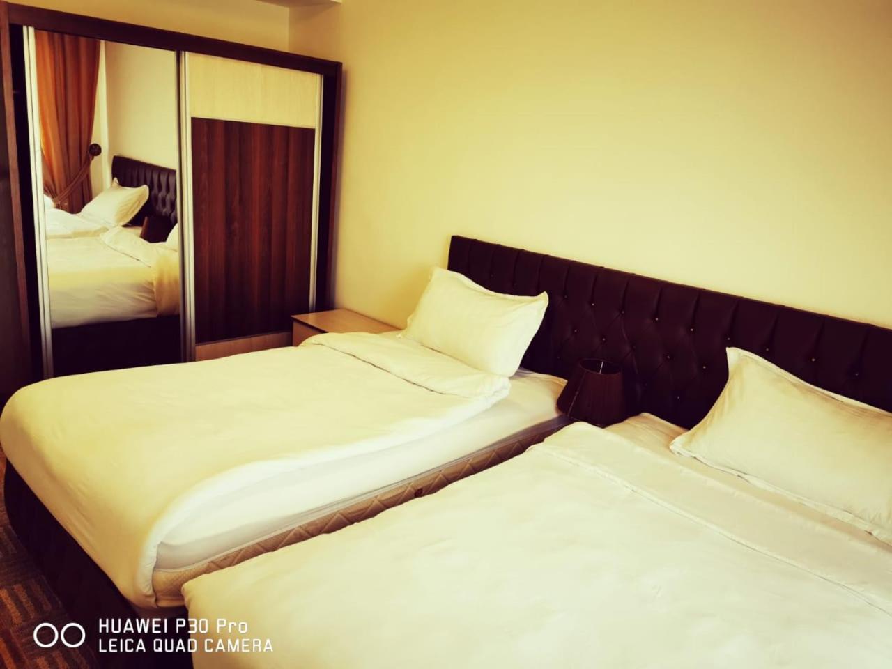 Three-Bedroom Apartment - Photo 7