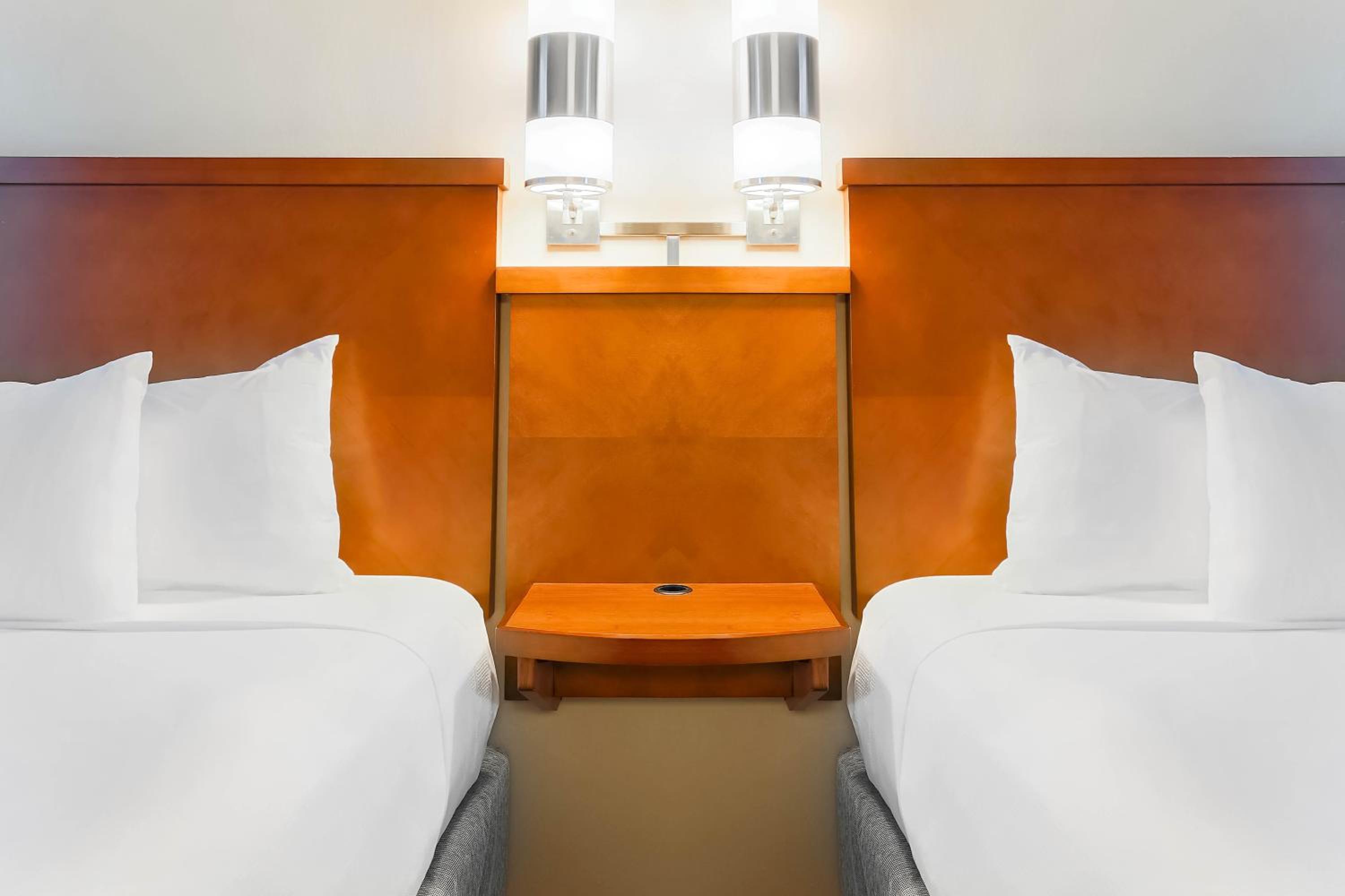 Queen Room with Two Queen Beds and Sofa Bed - Photo 9