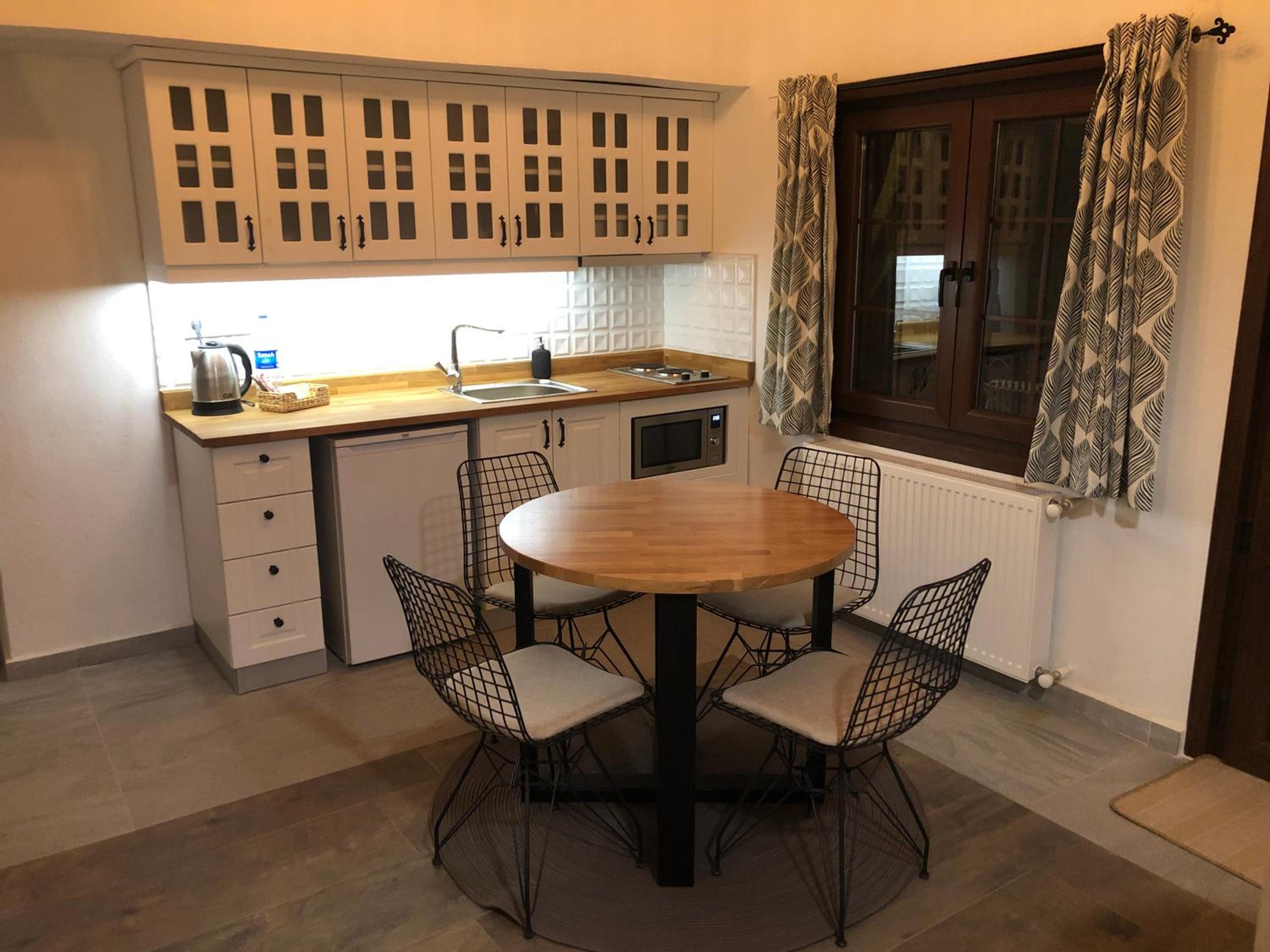 Deluxe Quadruple Room - Photo 8