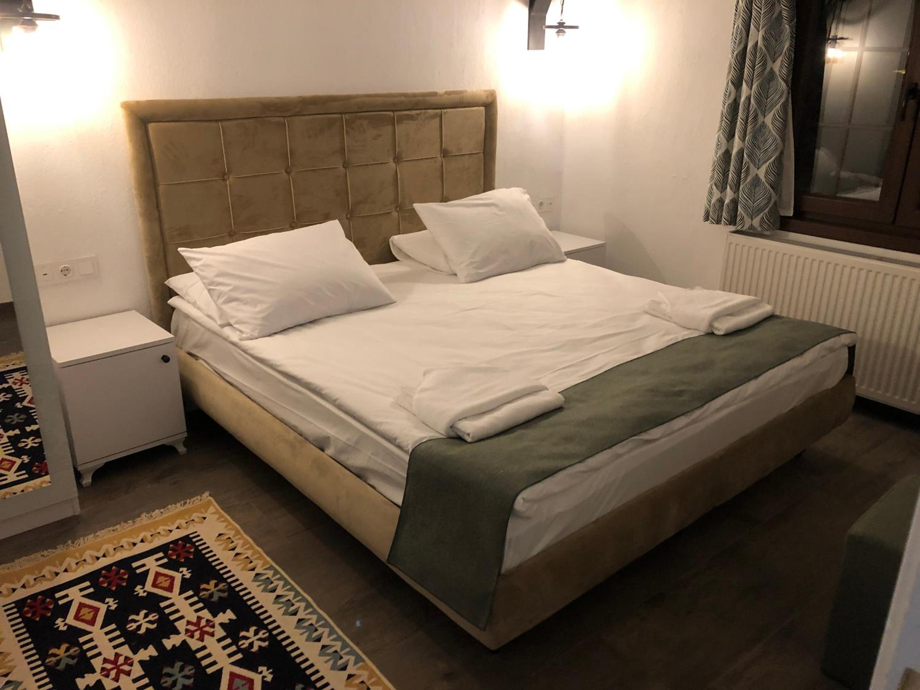 Deluxe Quadruple Room - Photo 26
