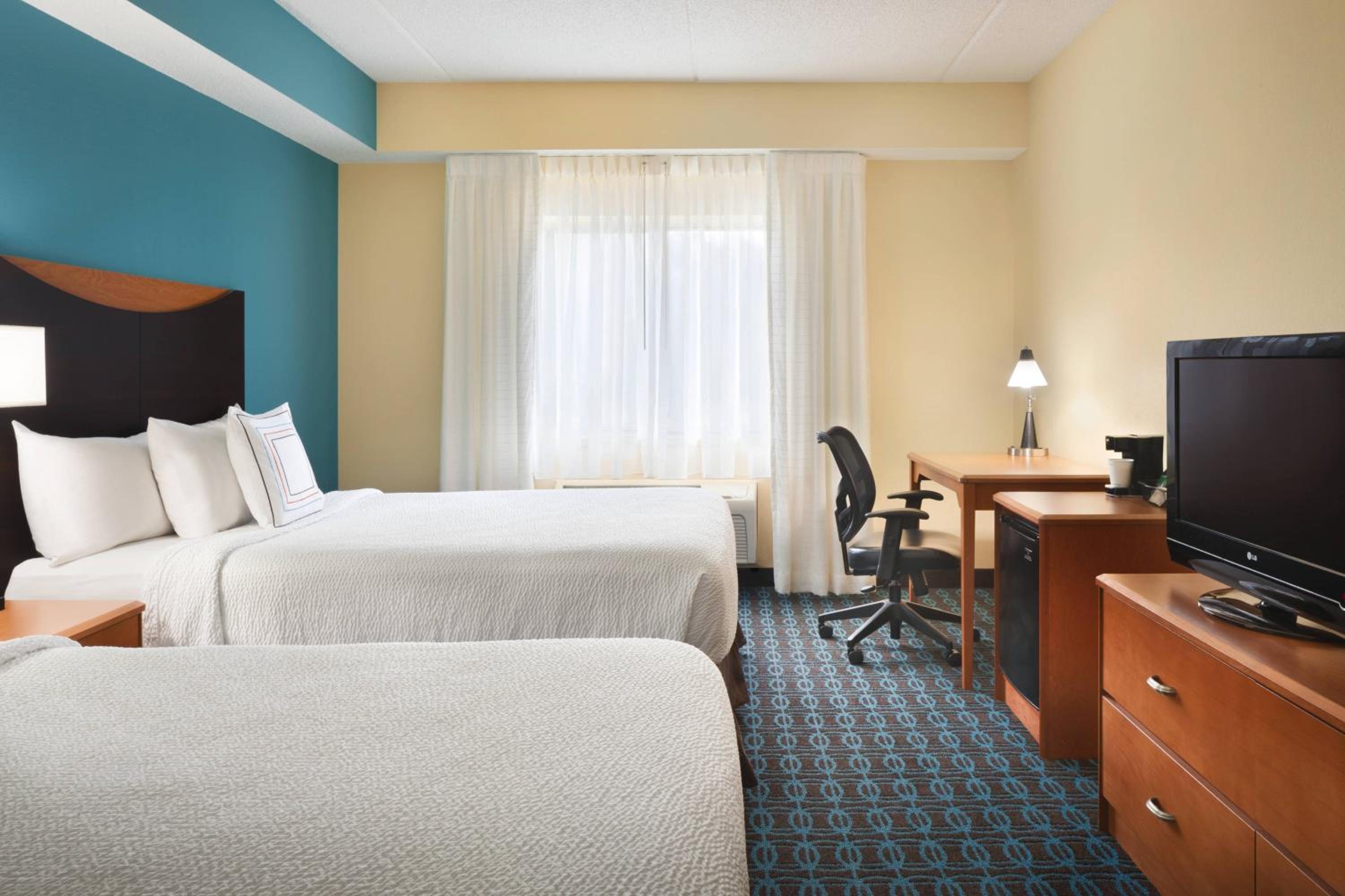 Queen Room with Two Queen Beds - Hearing Accessible photo 1