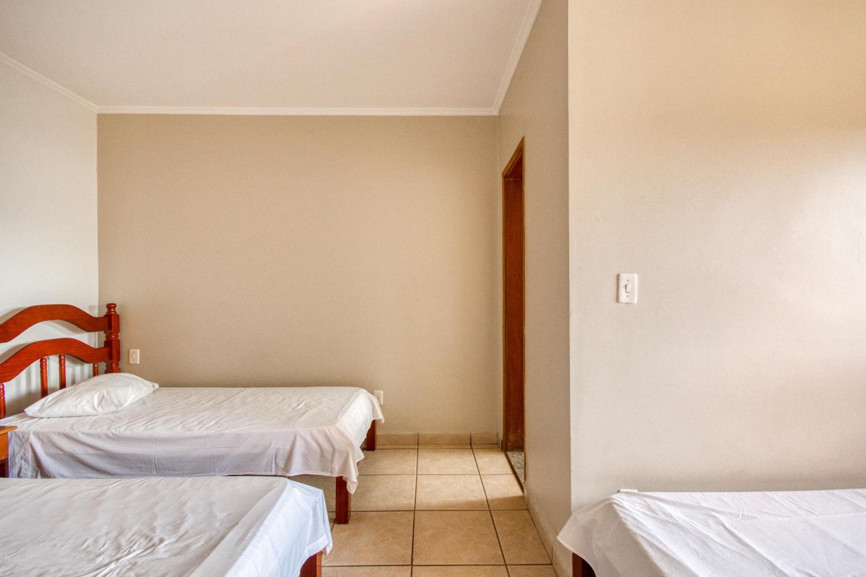 Quadruple Room (1 Double bed + 2 Single beds) photo 3