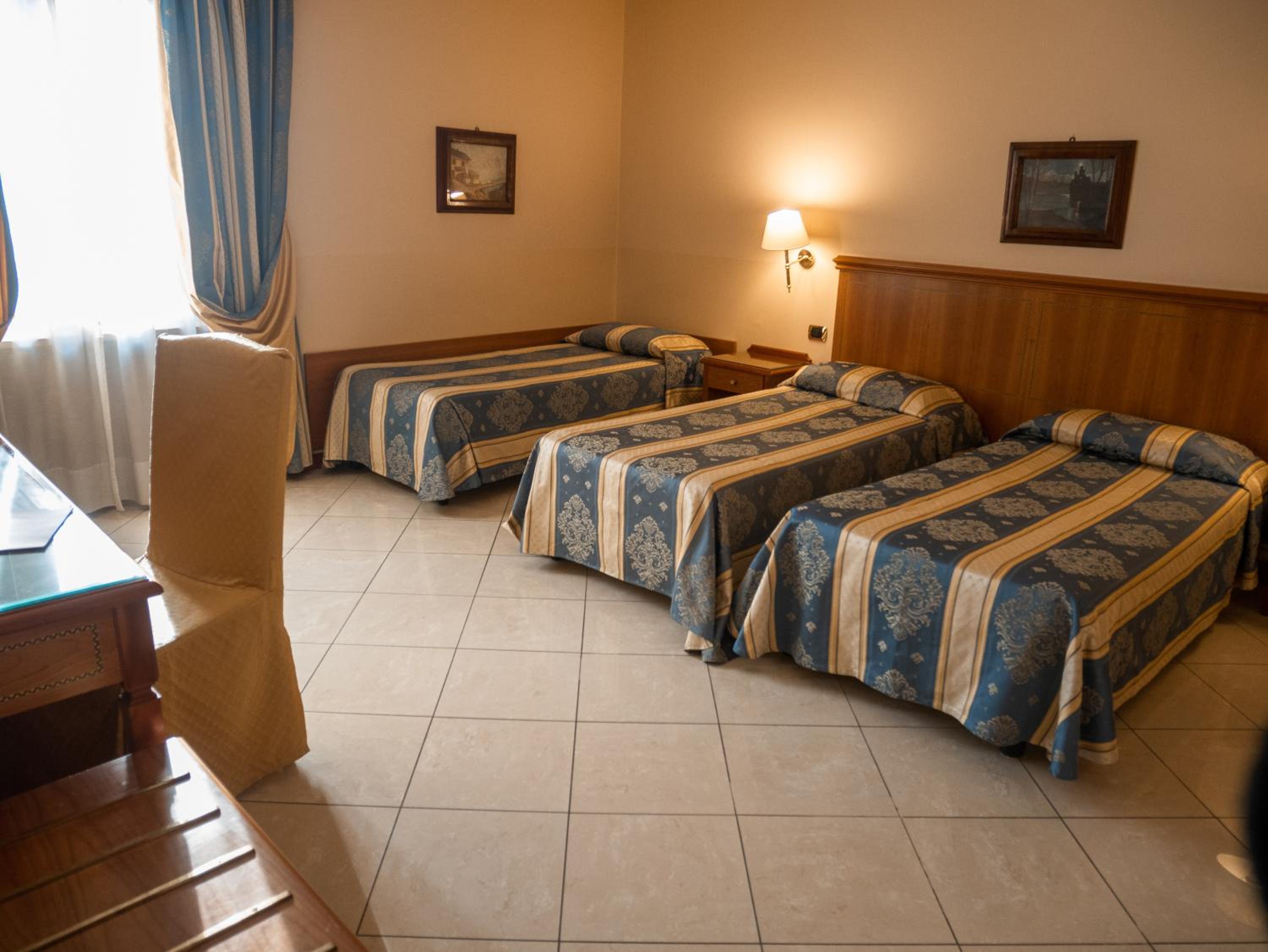 Economy Triple Room - Photo 1