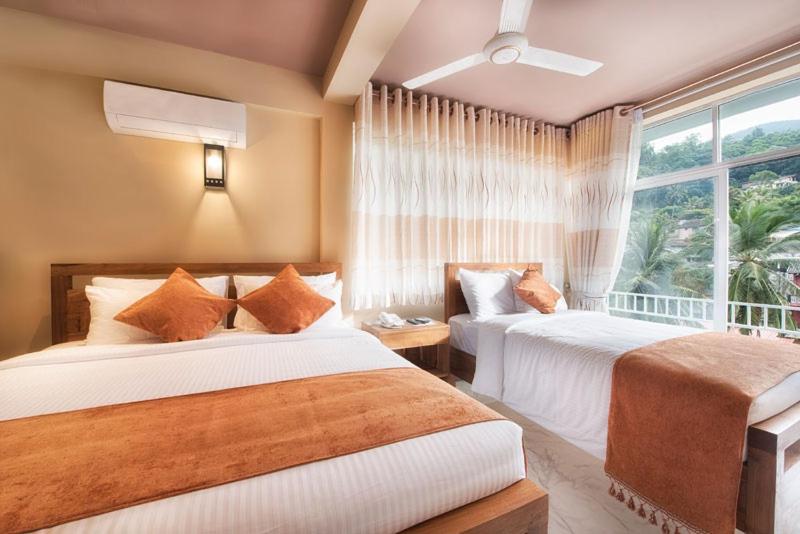 Deluxe Triple Room