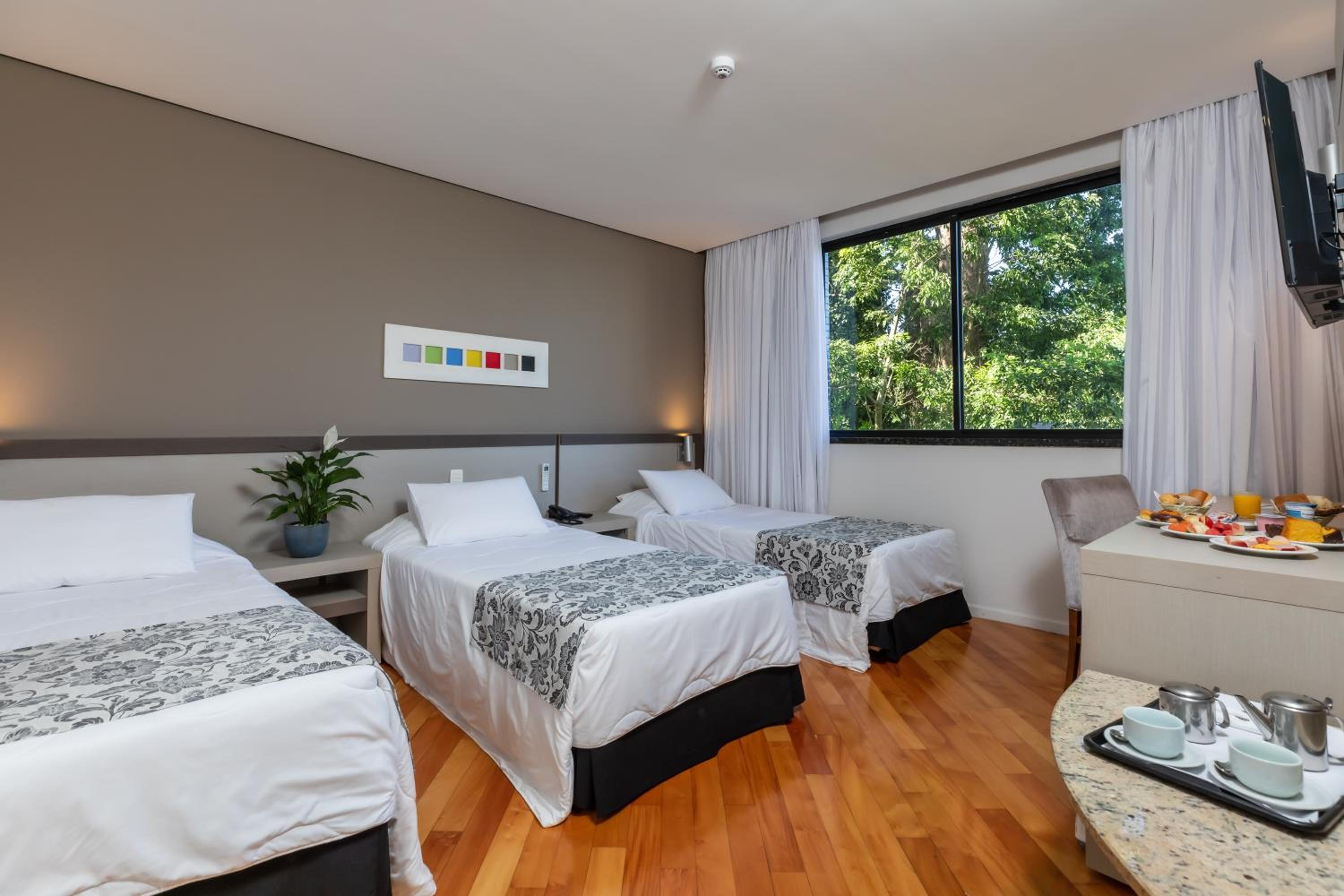 Deluxe Triple Room - Photo 1