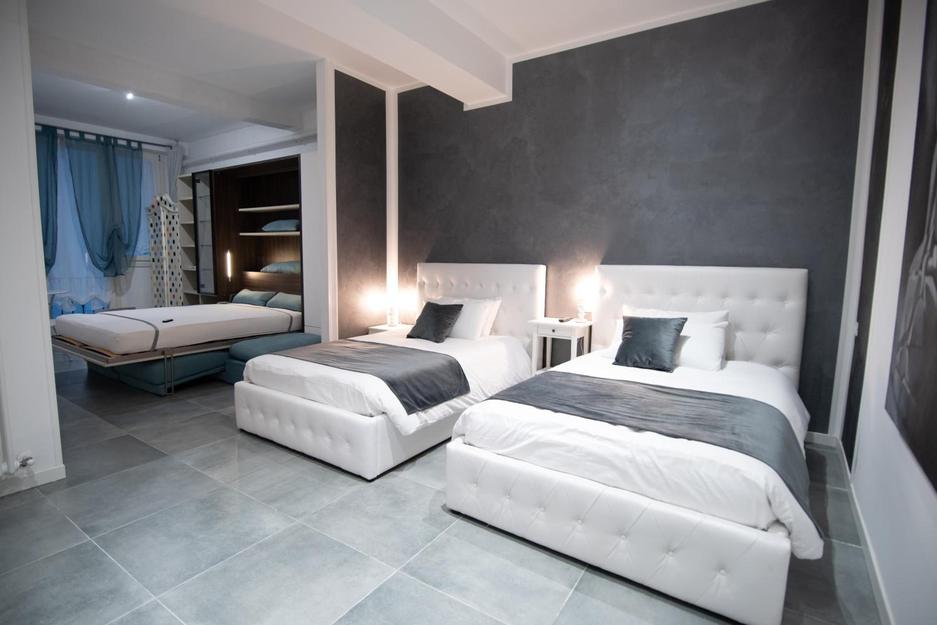 Deluxe Quadruple Room - Photo 1