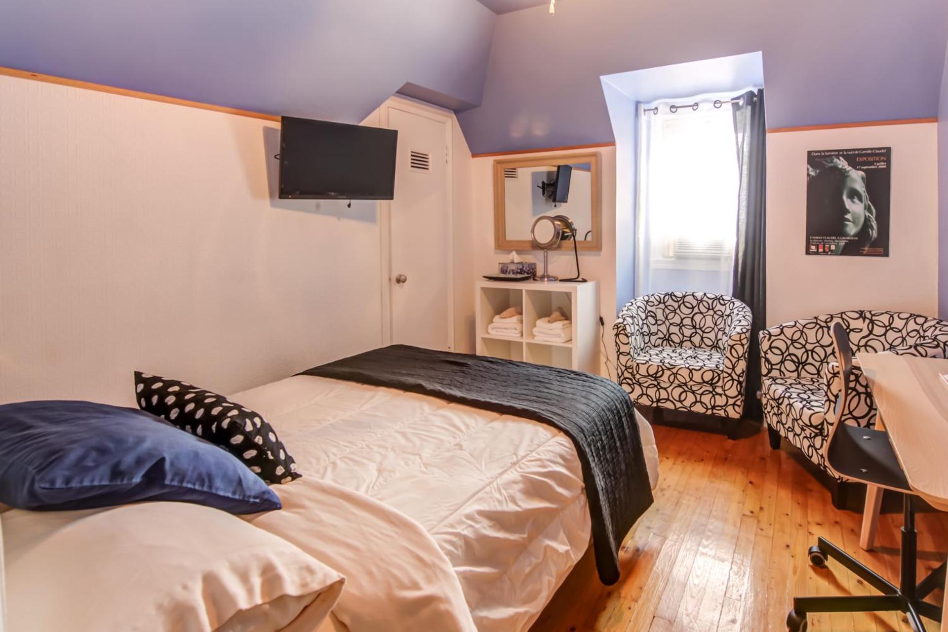 Quadruple Room with Private Bathroom photo 2