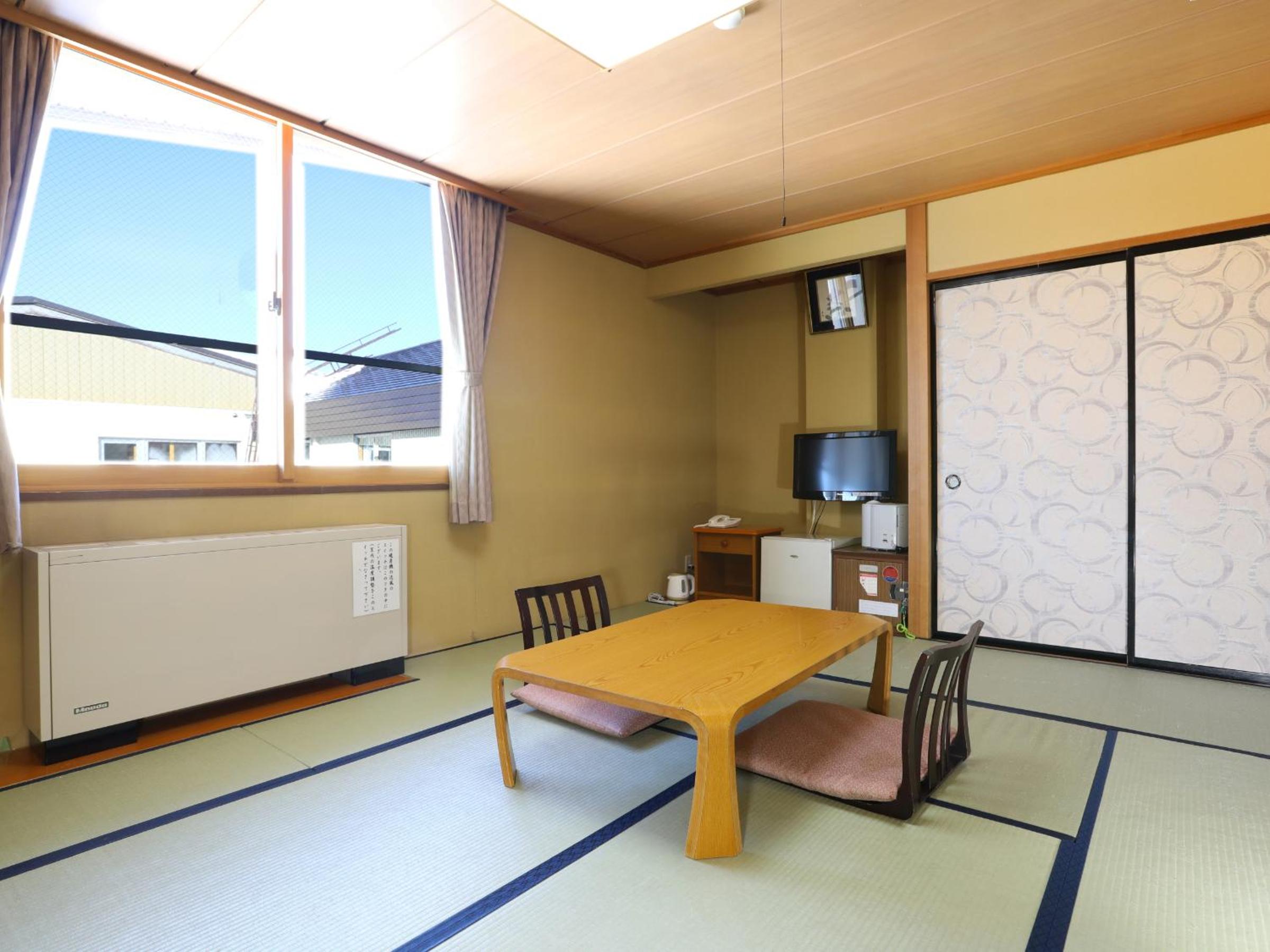 Quadruple Room with Shared Bathroom photo 2