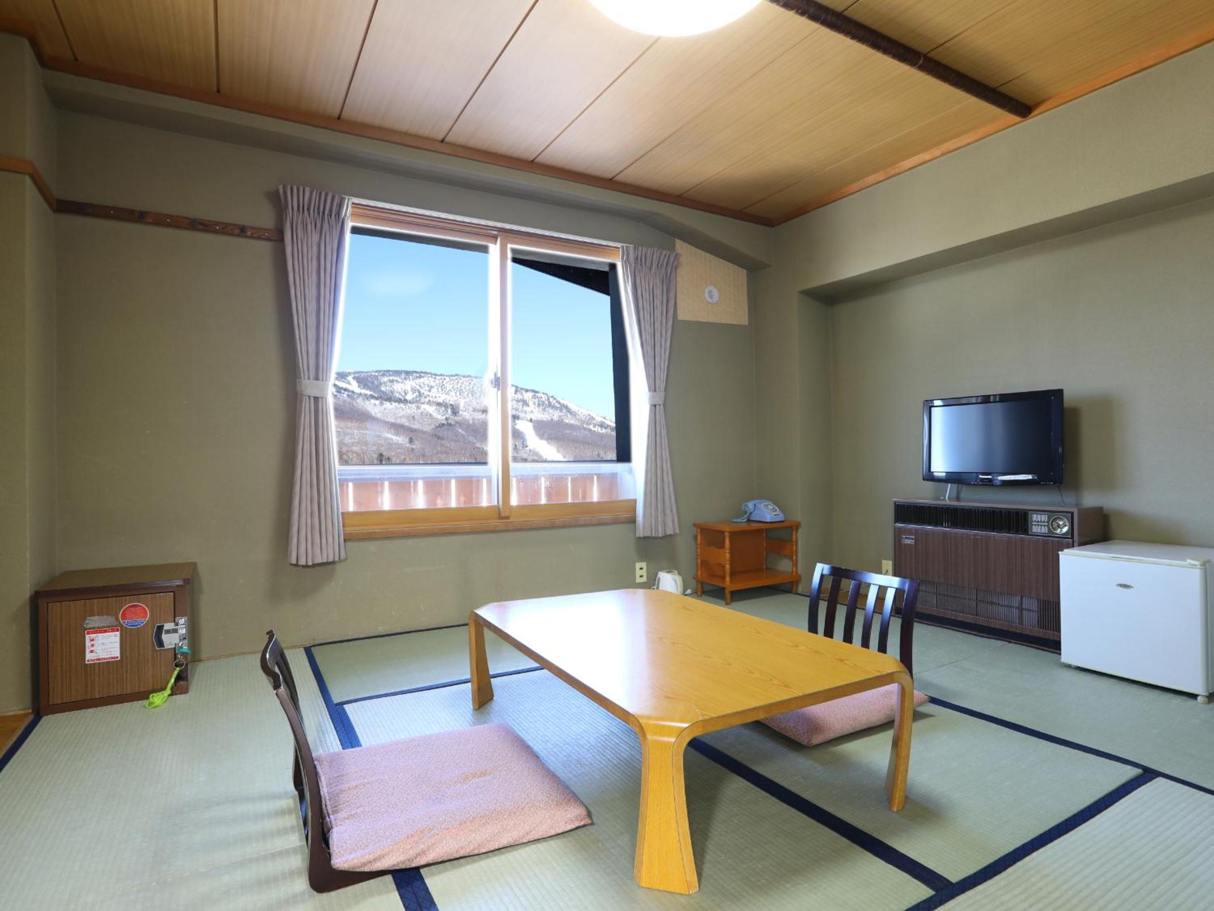 Japanese-Style Quadruple Room photo 3