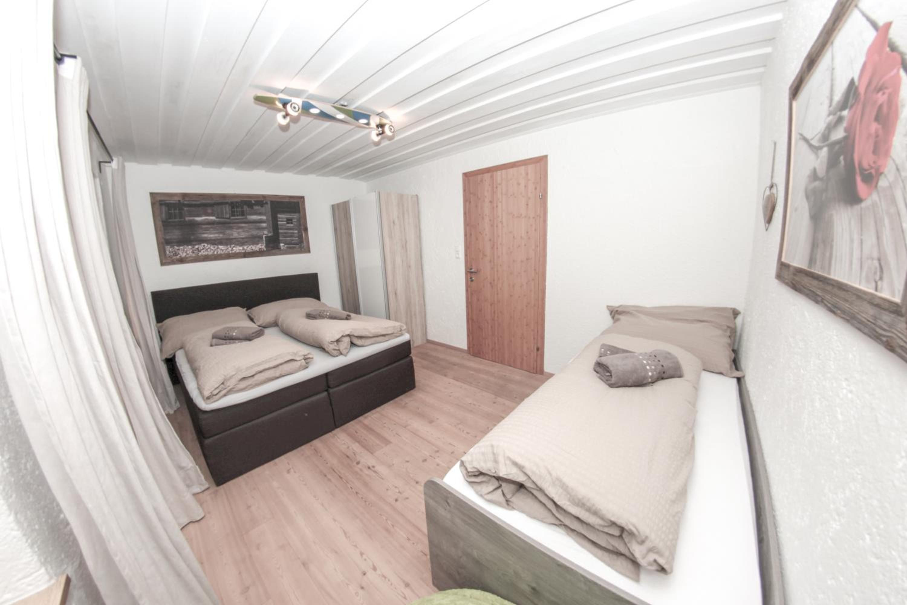 Three-Bedroom Apartment - Photo 33